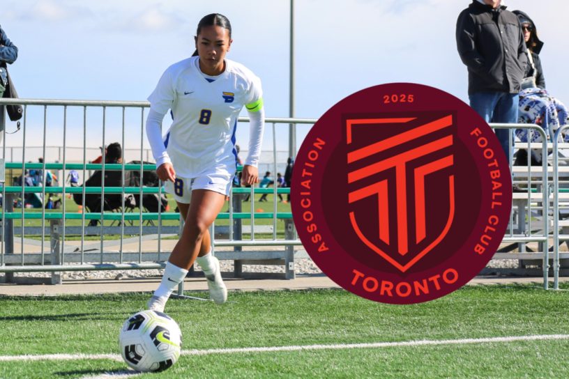 Ivymae Perez about to kick a corner with a logo of AFC Toronto to her side announcing her signing with the team