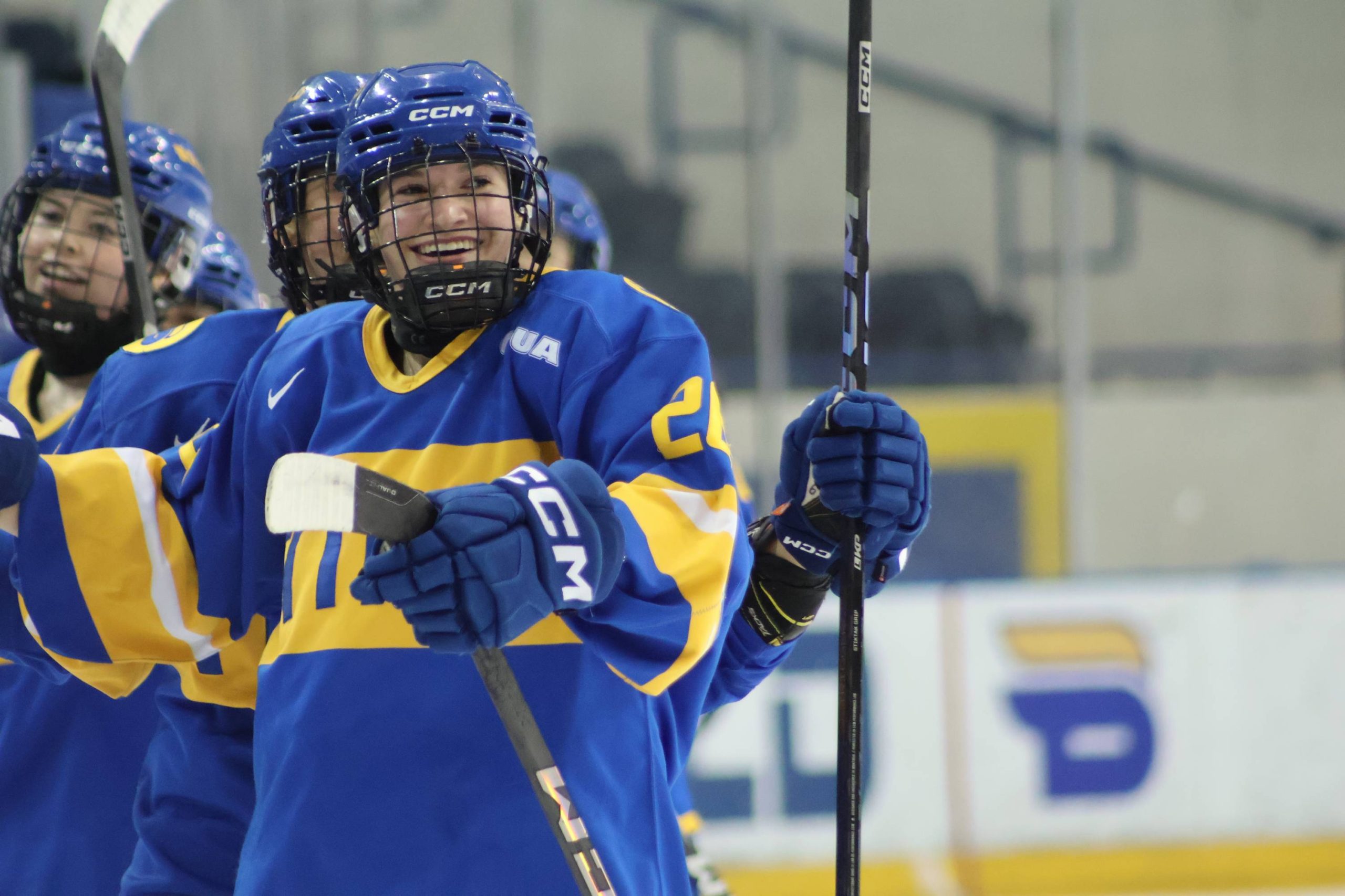 A Bold player smiling after her goal