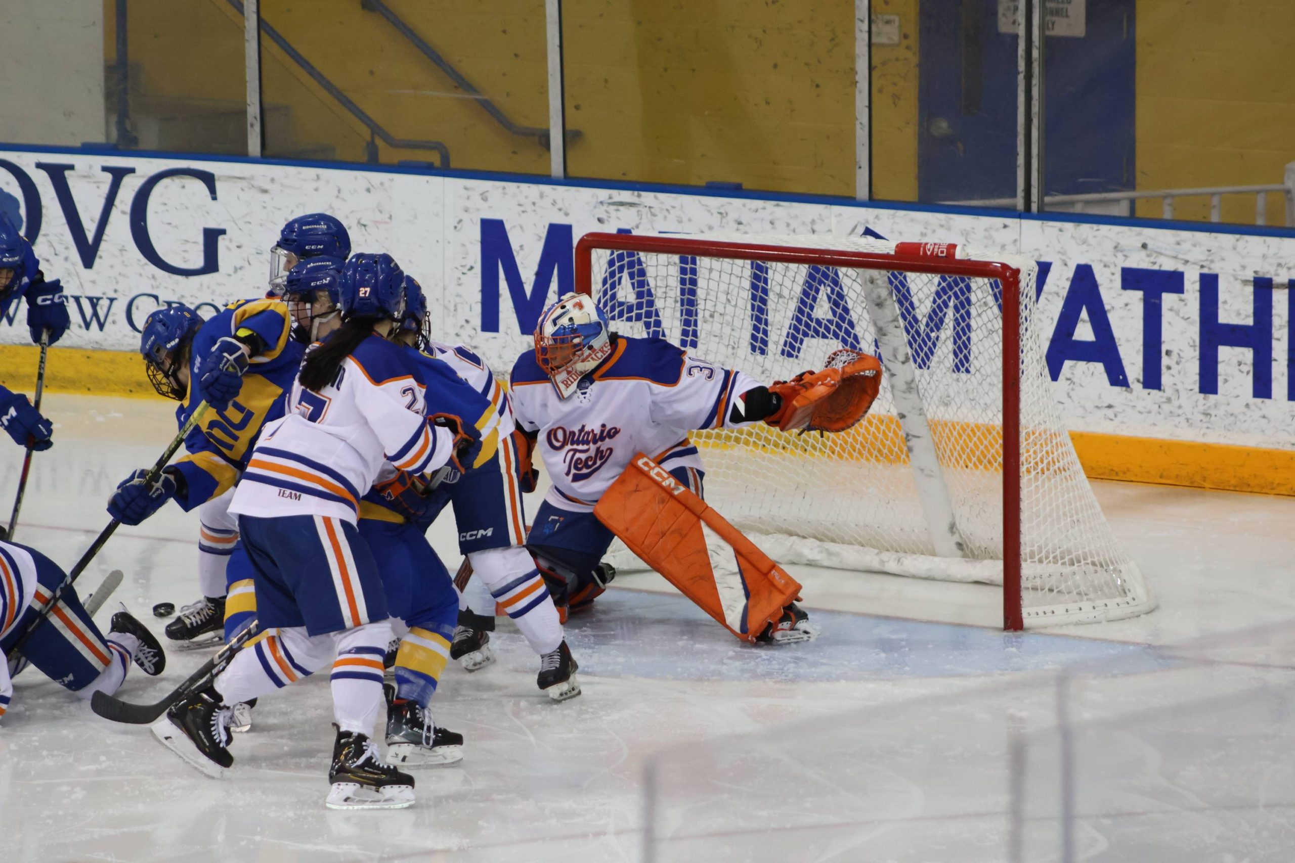 The Bold in the middle of a scramble shooting for goal