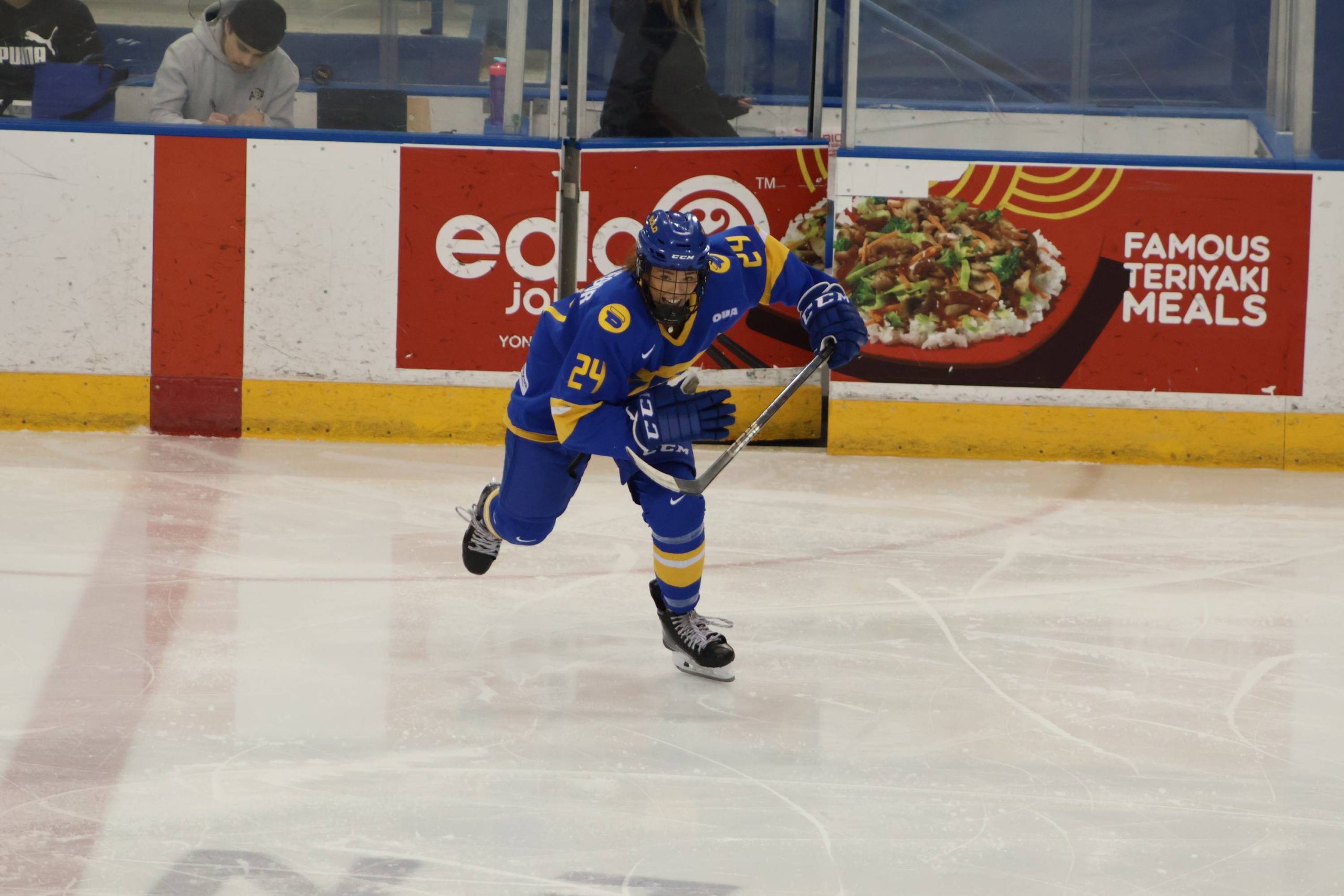 Payton Kerr skating towards the puck