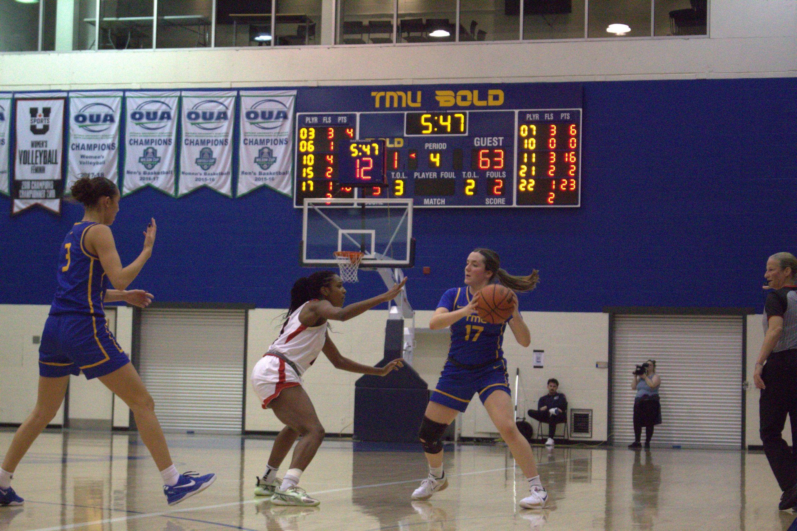 Catrina Garvey holding the ball while attacking