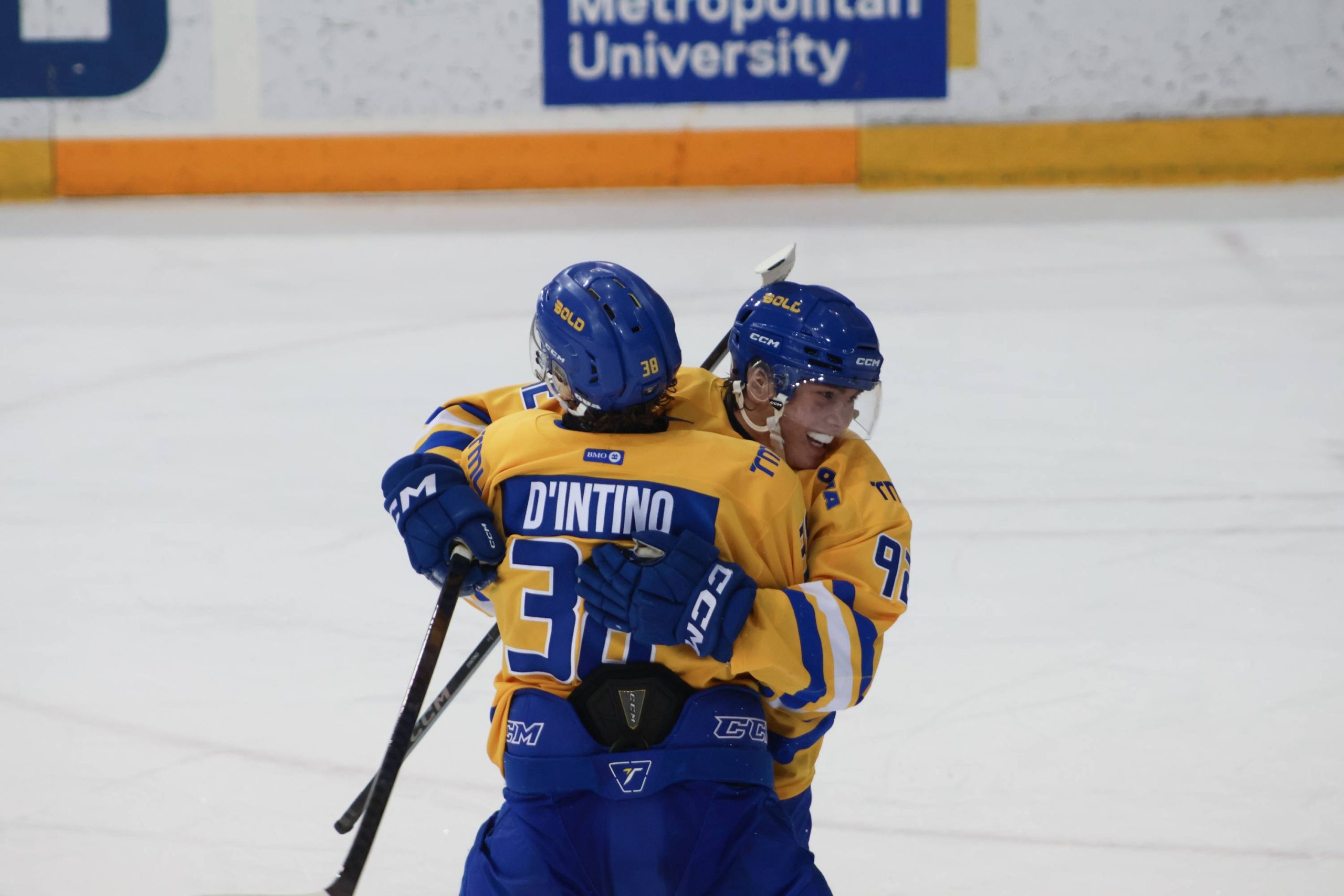 two TMU Bold players celebrating the win