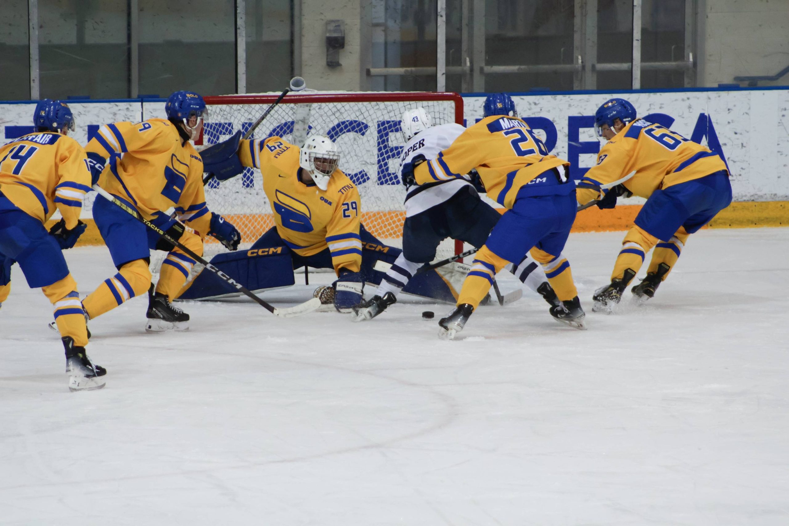 The TMU Bold team trying to defend an attack frm U of T