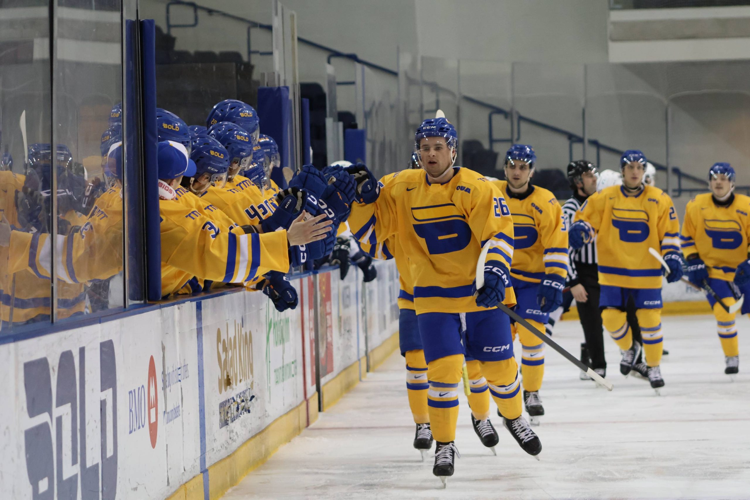 Ian Martin celebrating his goal with the bench