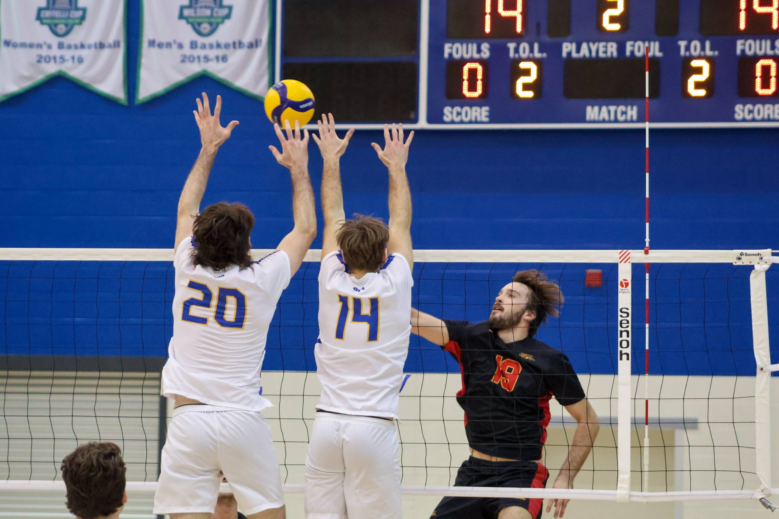 A Gryphons player sending the ball