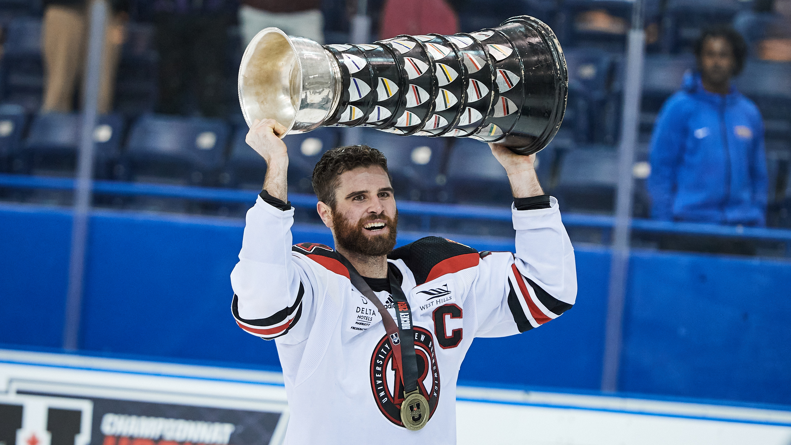 Jason Willms lifts the U Cup