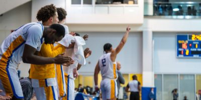 The TMU Bold bench celebrating a point