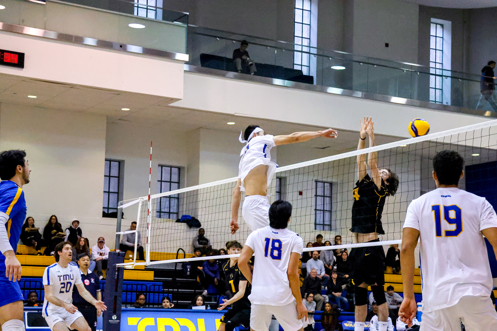 Bobby Tang hitting the ball for a kill