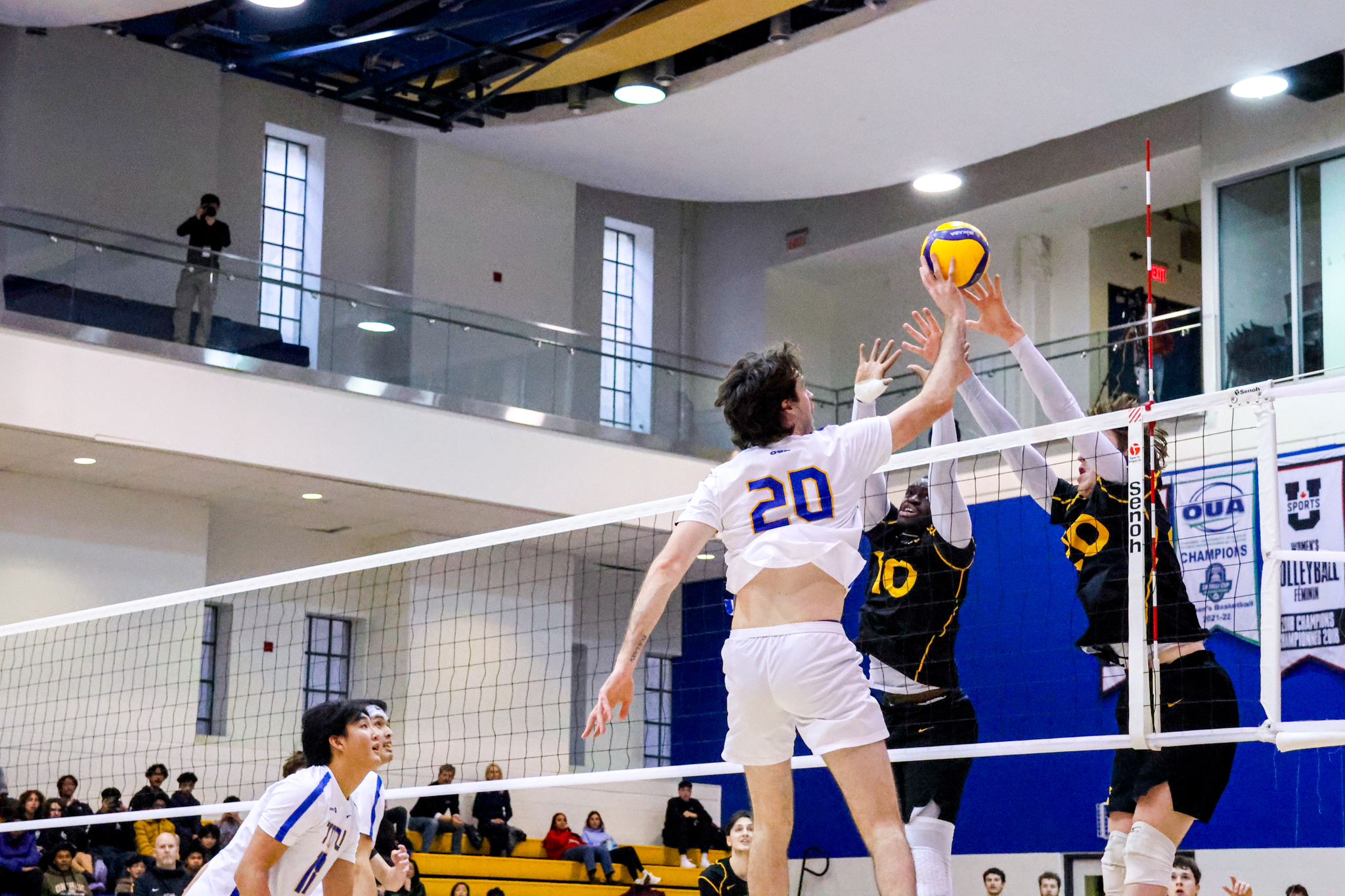 Alex King tipping the ball over at the wall