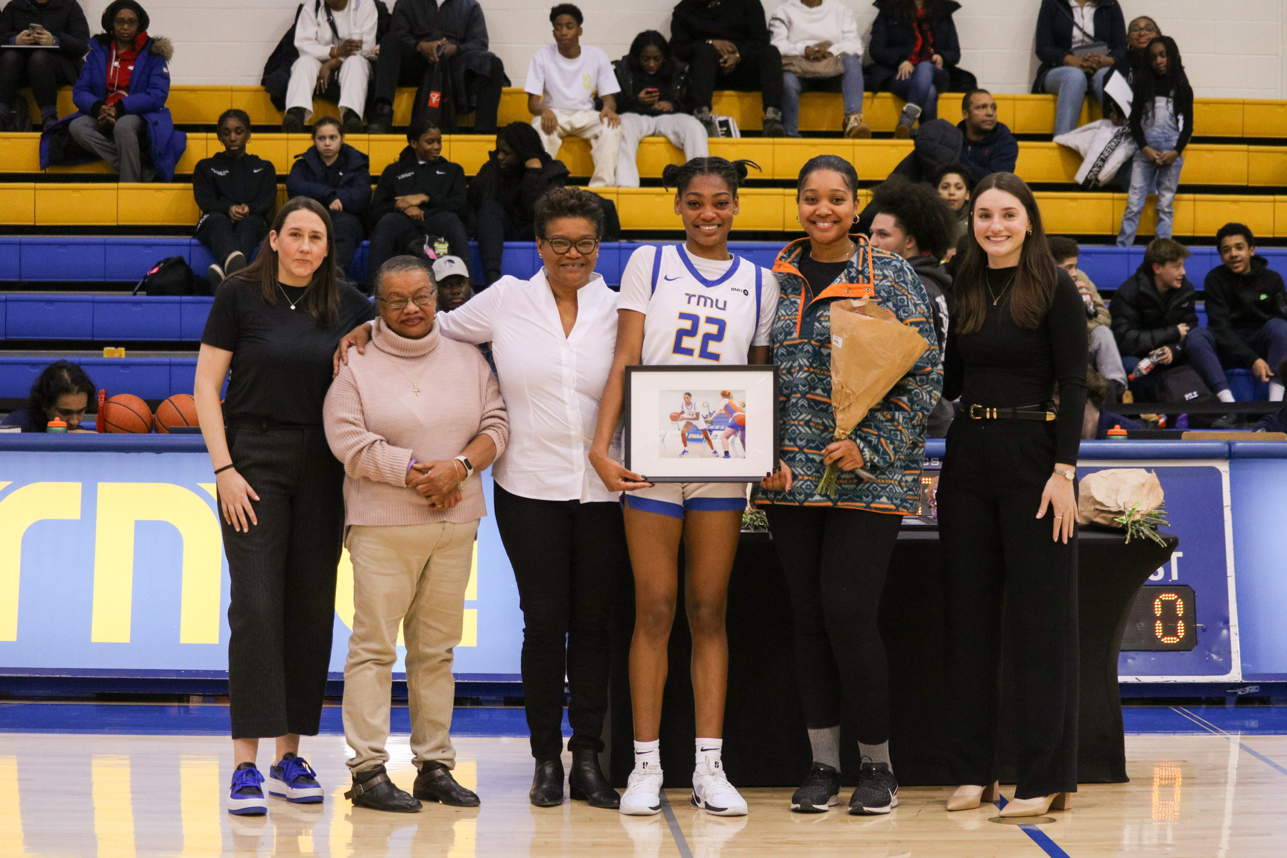 Lauryn Meek with her family celebrating seniors night