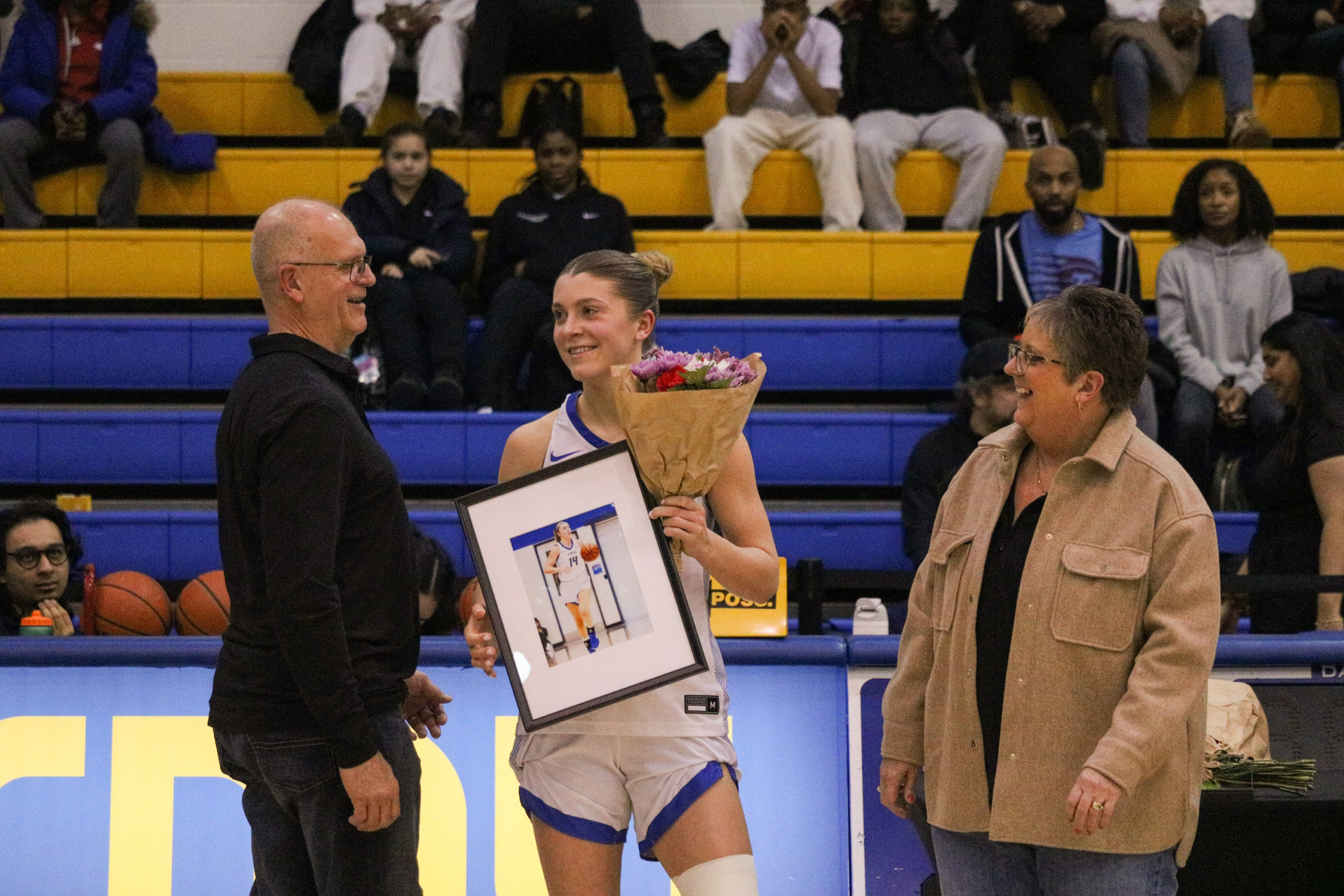 Kaillie Hall with her family celebrating seniors night