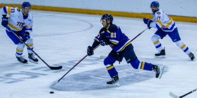 Olivier Pouliot skating with the puck against the Bold in a pre-season matchup