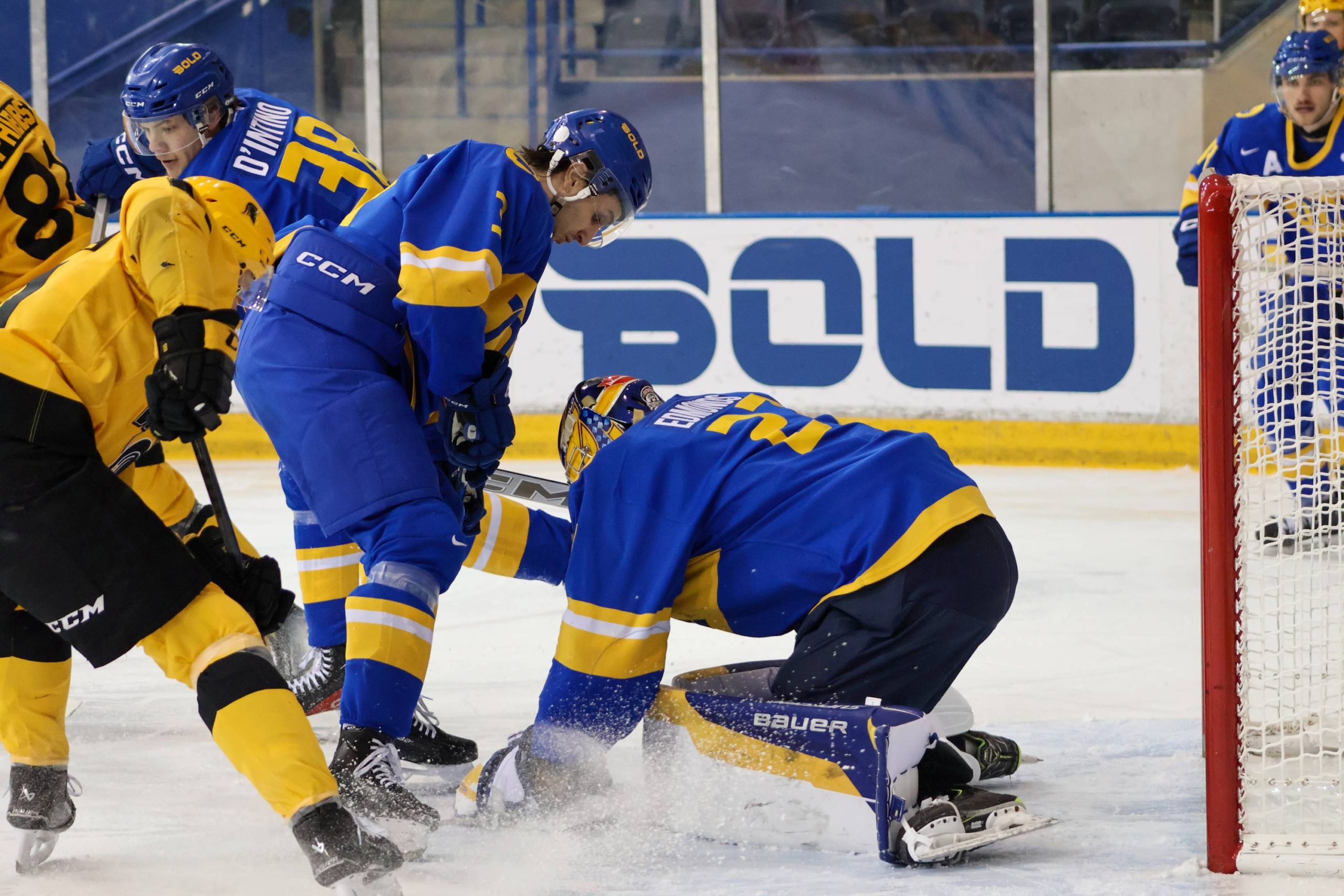 Kai Edmonds grabbing the puck during an attack from the Warriors