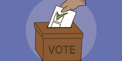 an illustration of a hand putting a ballot inside of a voting box