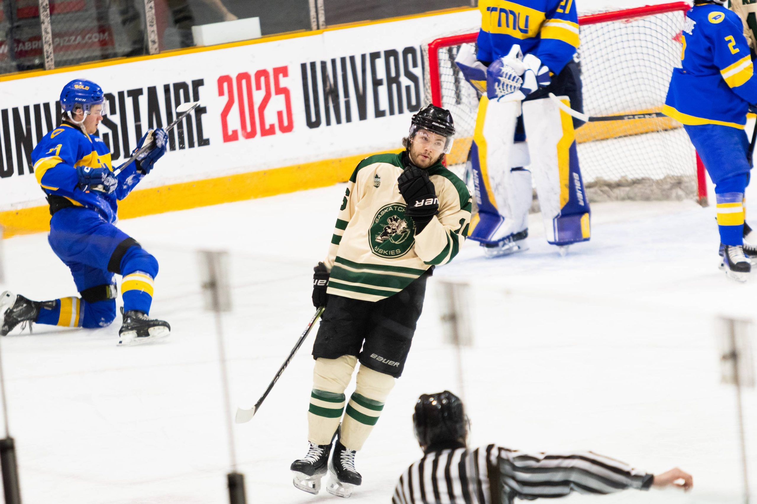 A Huskie player skating