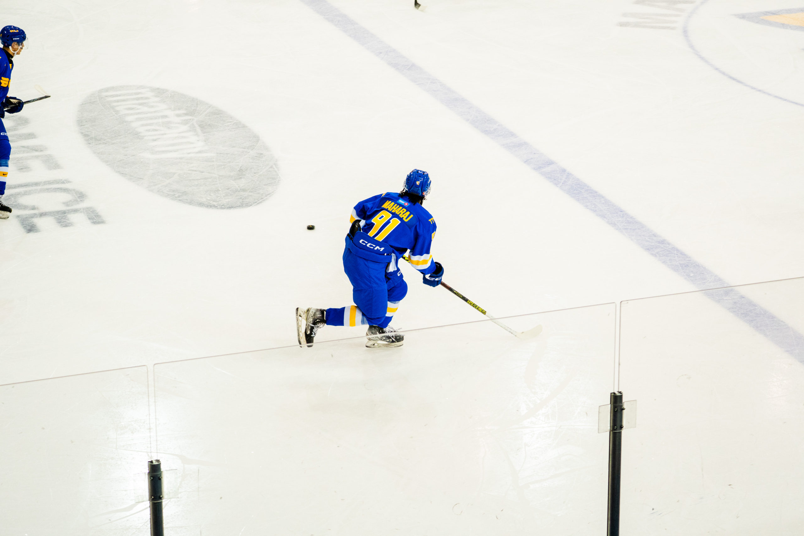 A TMU player prepares to receive the puck