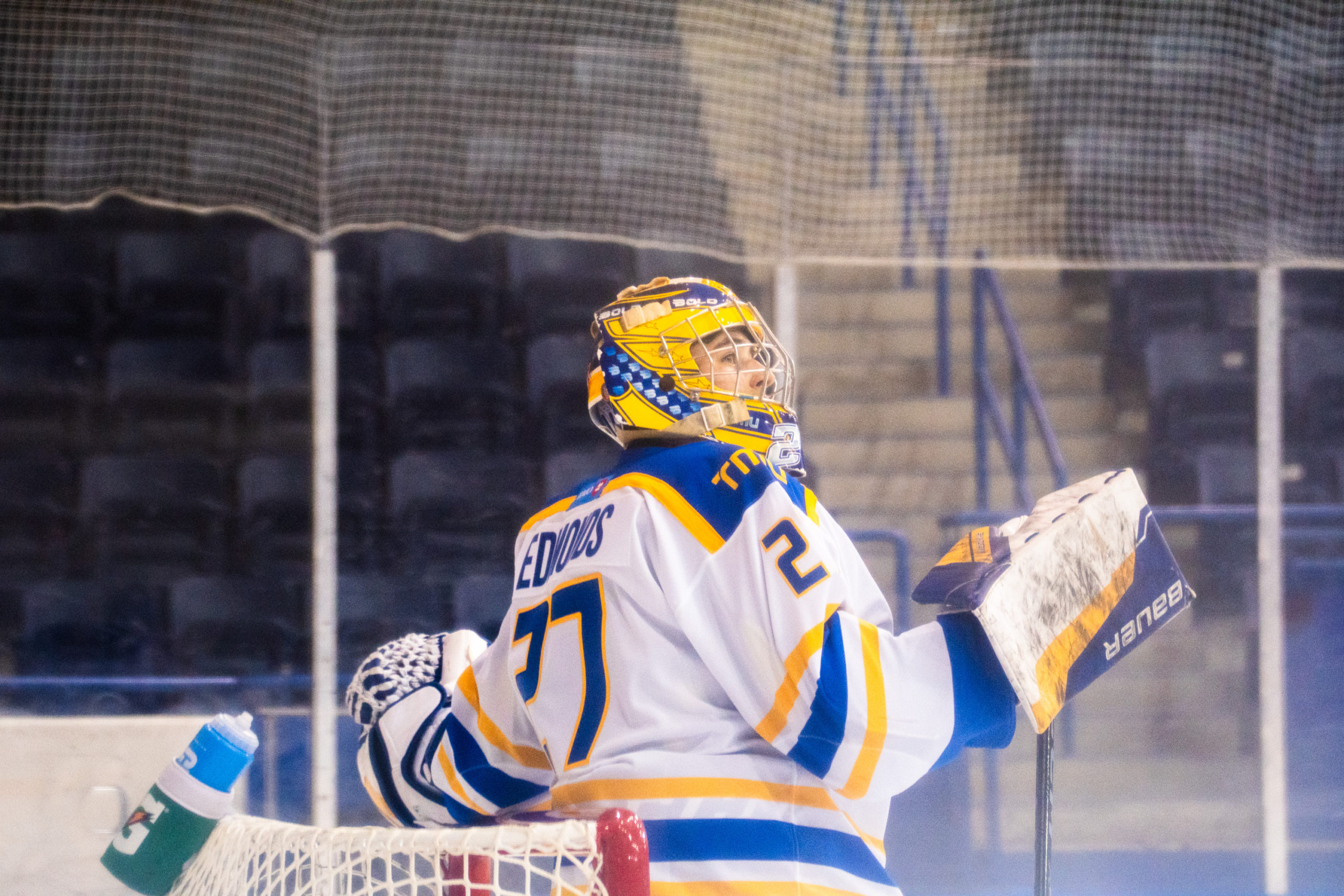Kai Edmonds stands in front of his net