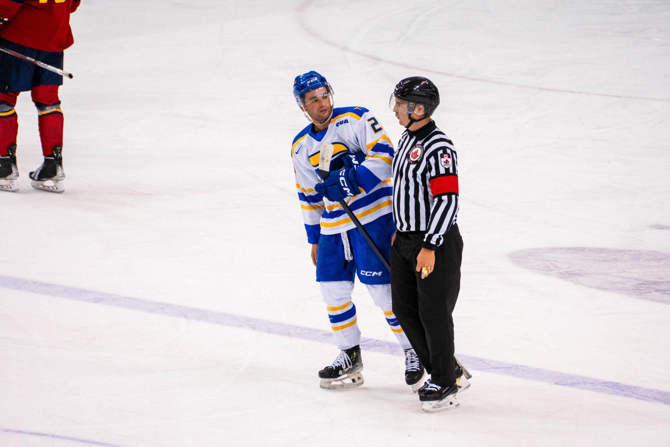 Ian Martin talks with a linesman