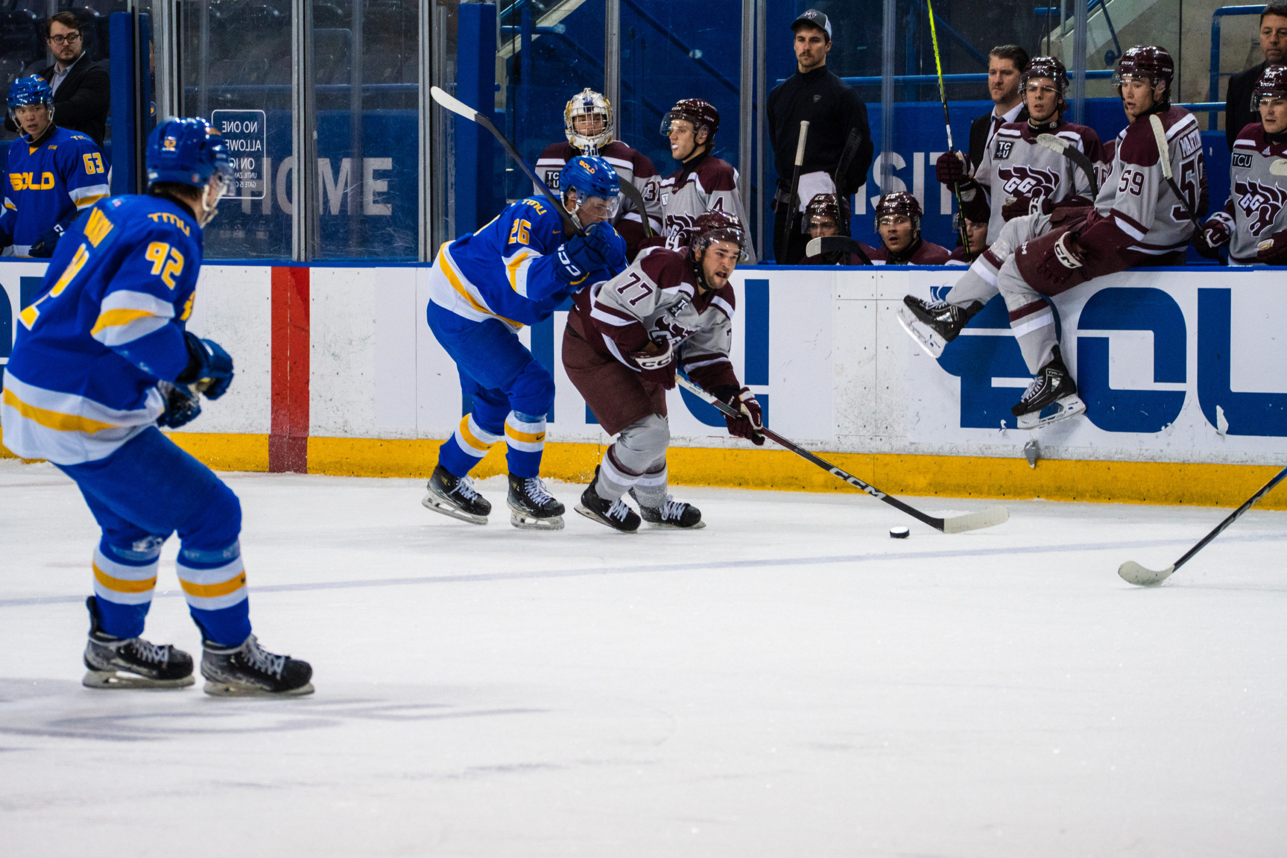 A TMU and Ottawa player get scrappy for possession
