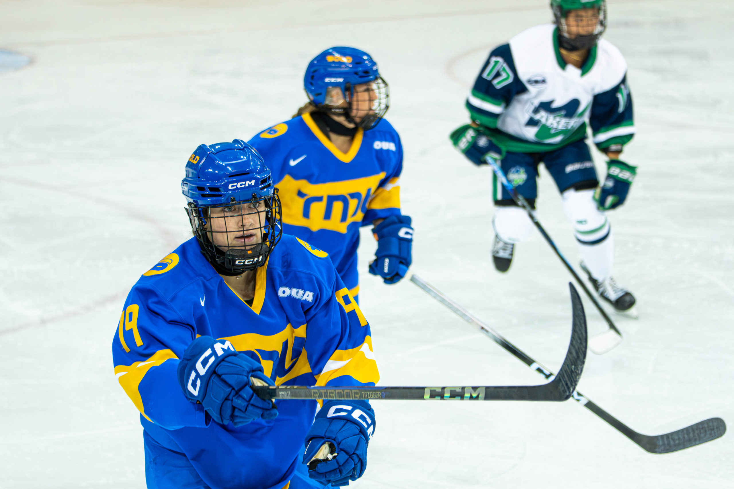 Abby Fletcher looks forward with a serious expression