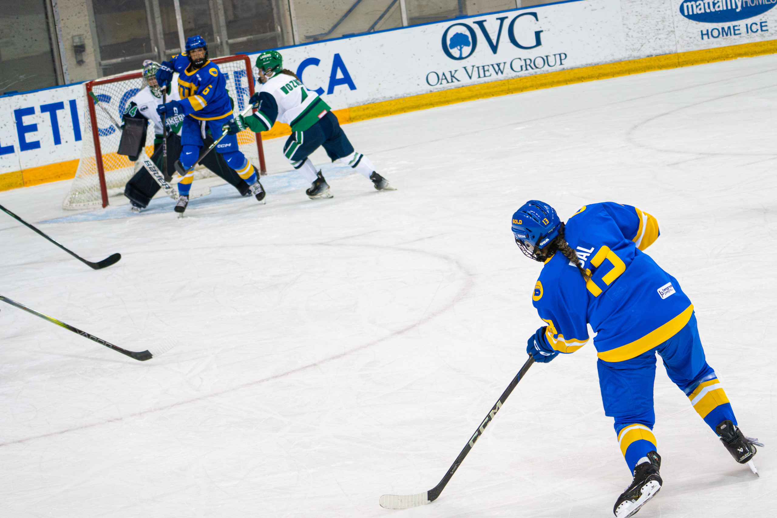 Nahvin Bal aims the puck at the net