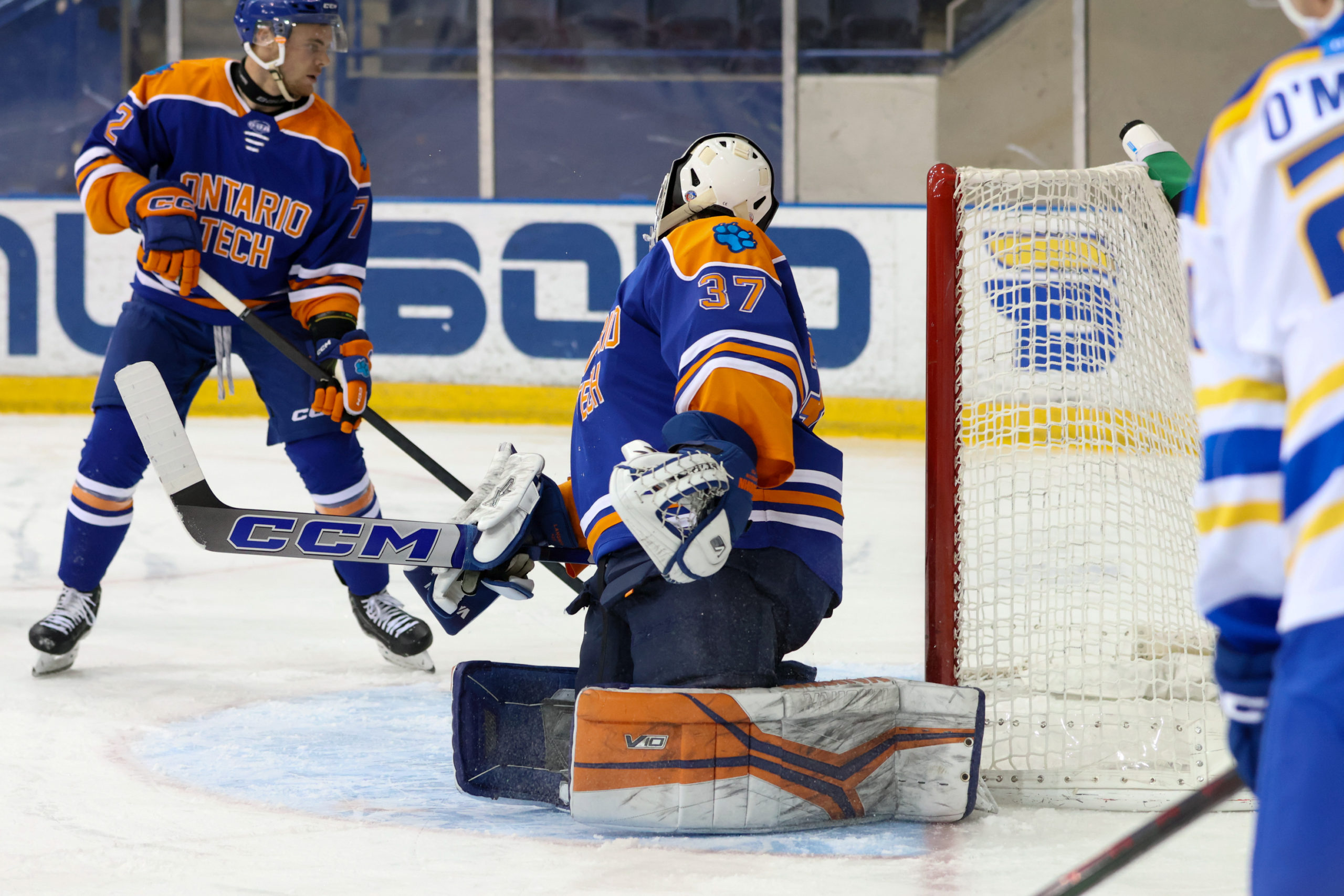 An Ontario Tech goaltender looks to his right