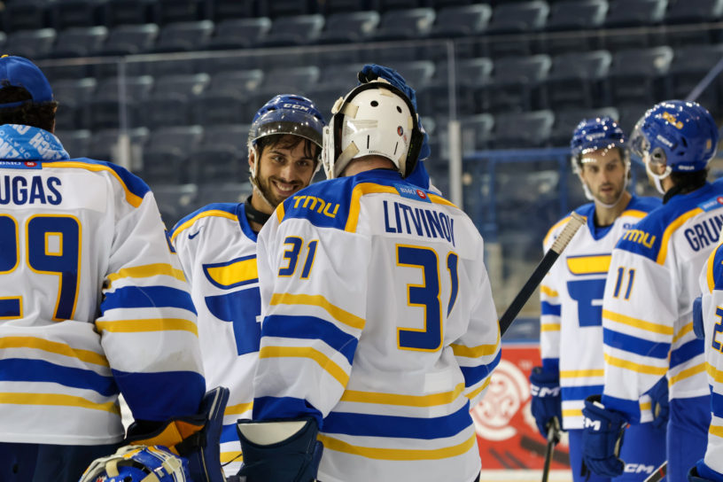 TMU celebrates their win against Ontario Tech