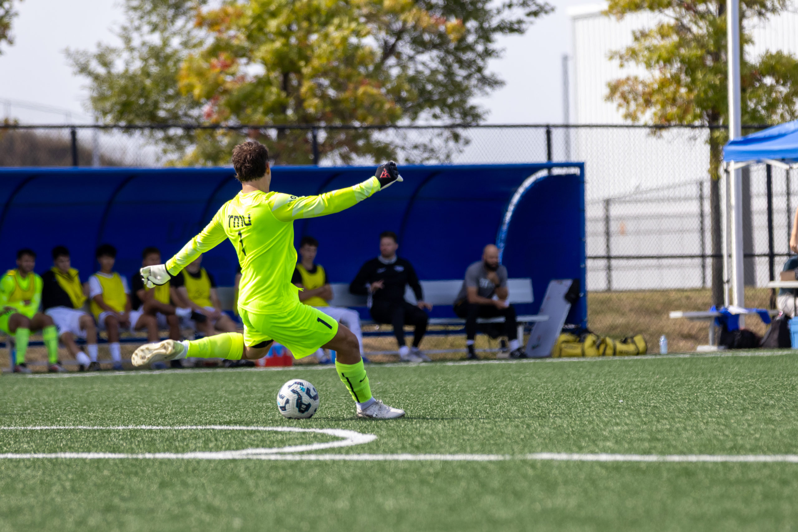 Dante Ferraro clearing the ball from TMU's half just outside the penalty box