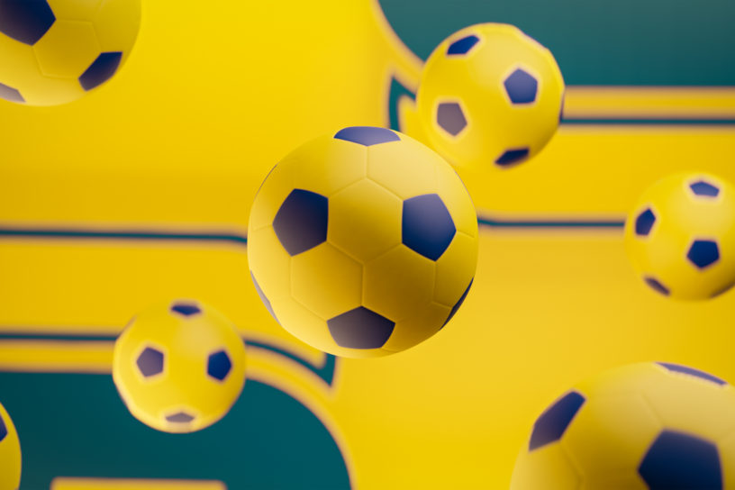 Illustration of yellow soccer balls floating around the frame.