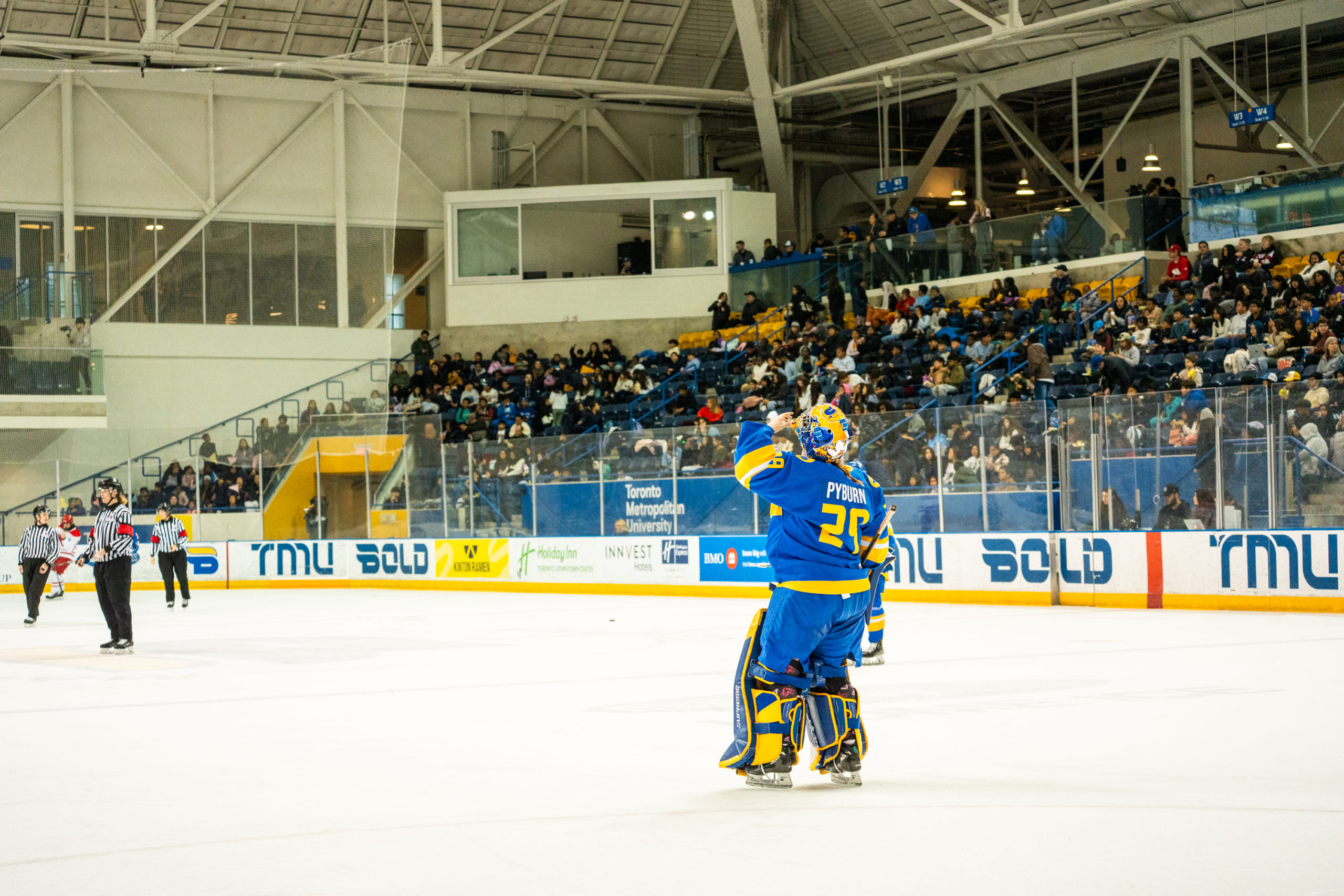 TMU's goaltender watches the ice