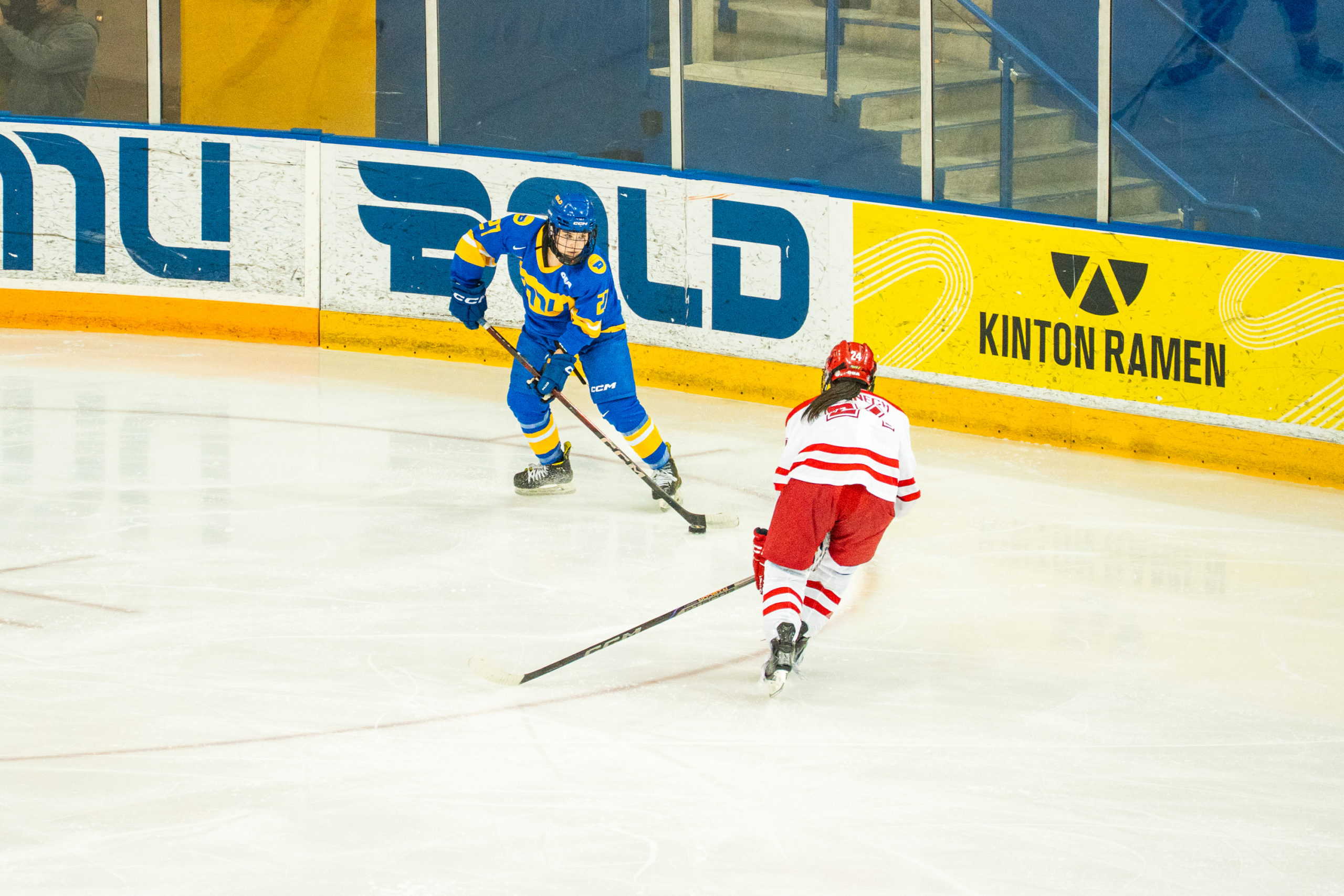 A TMU player attempts to maintain possession