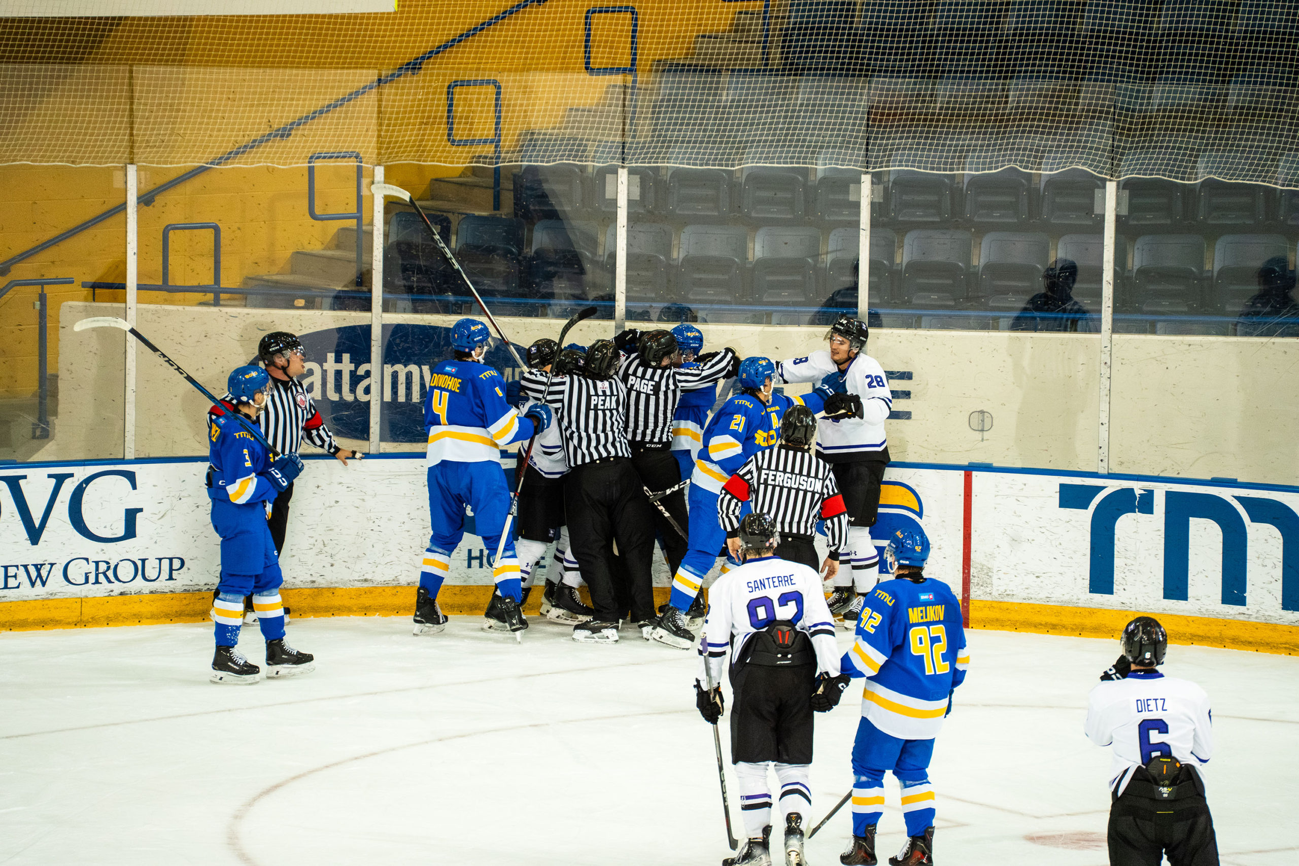 A scrum ensues between TMU and Western
