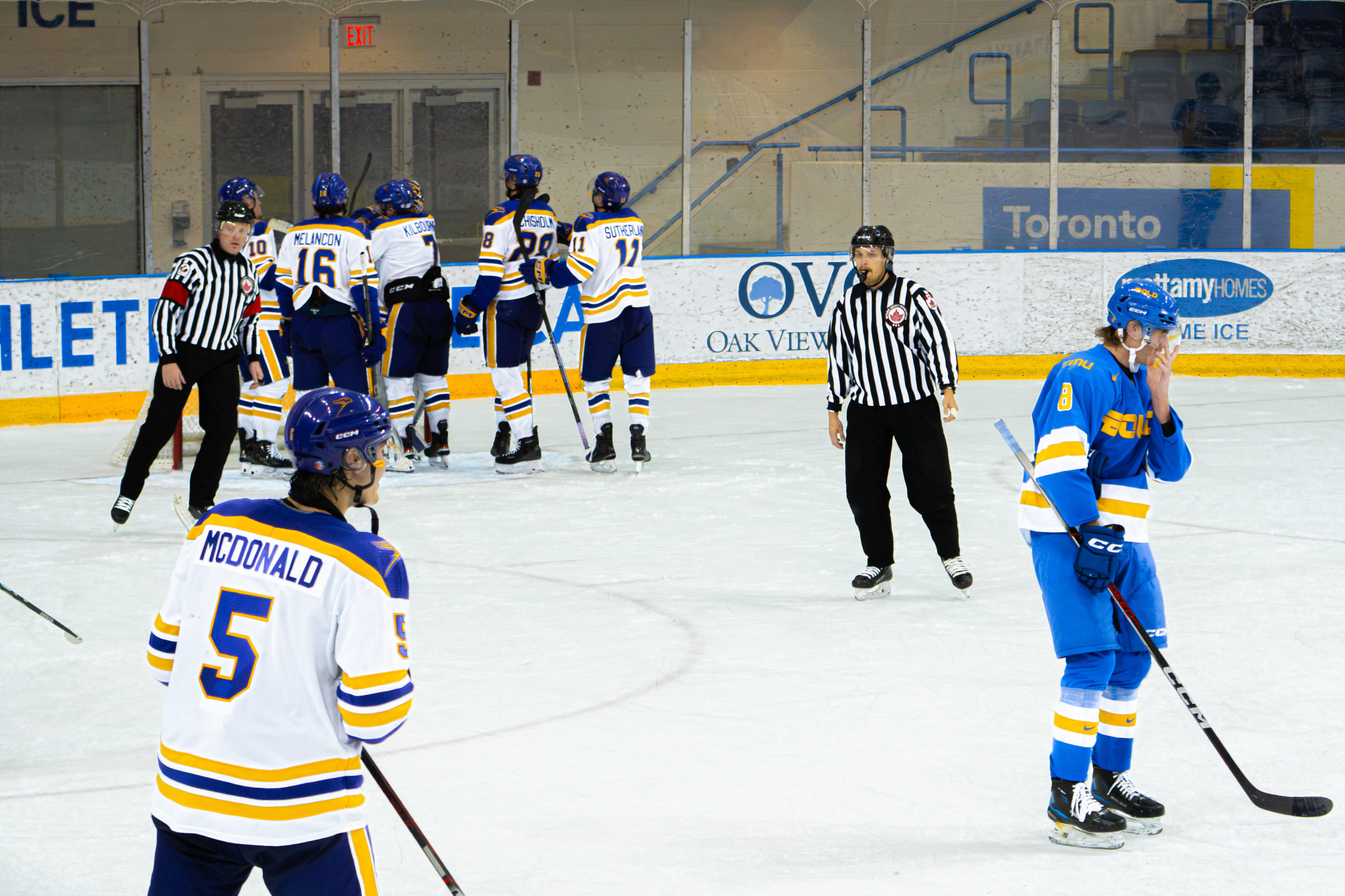 Laurier Golden Hawk players celebrate a goal at the Mattamy Athletic Centre