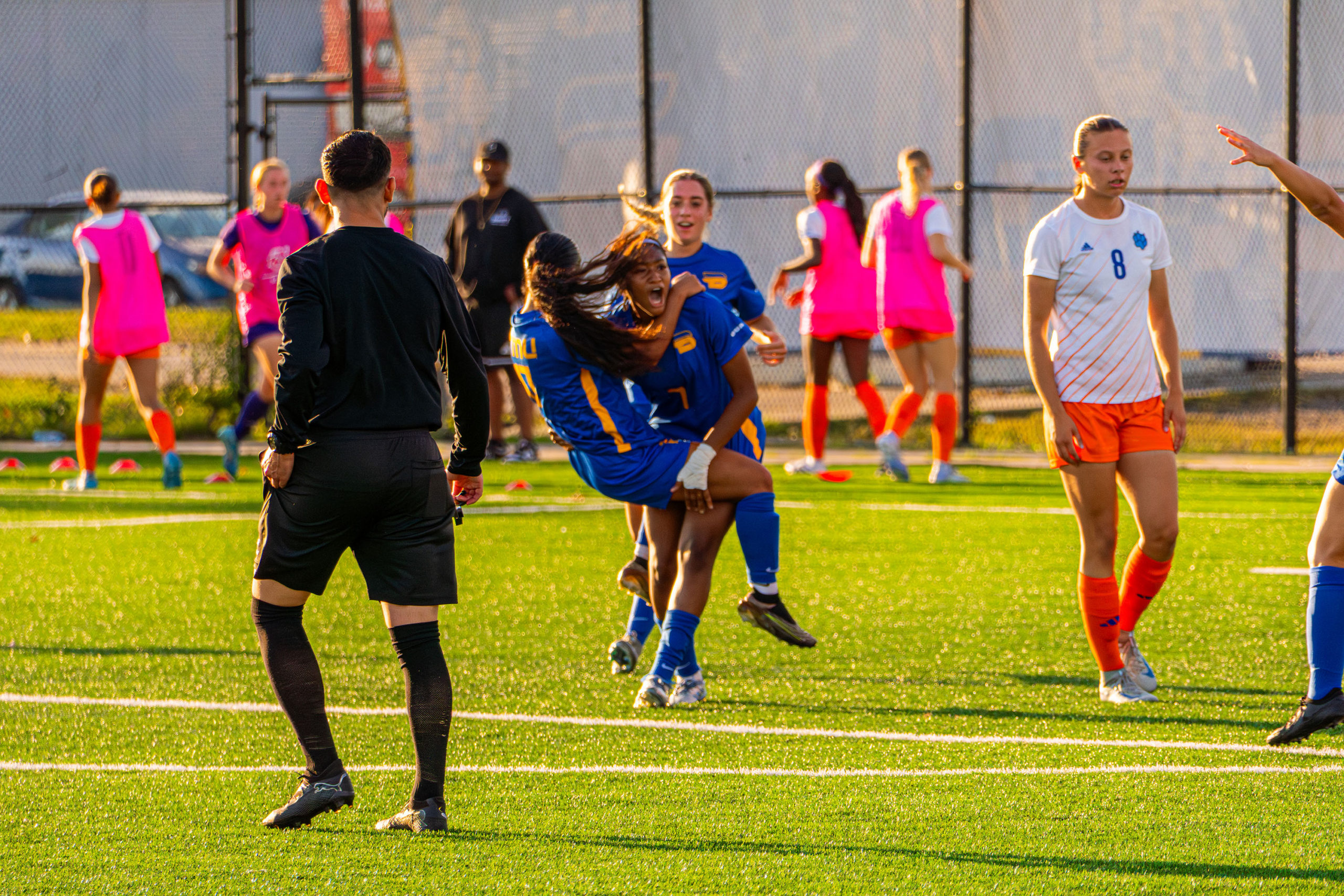 TMU celebrates a goal