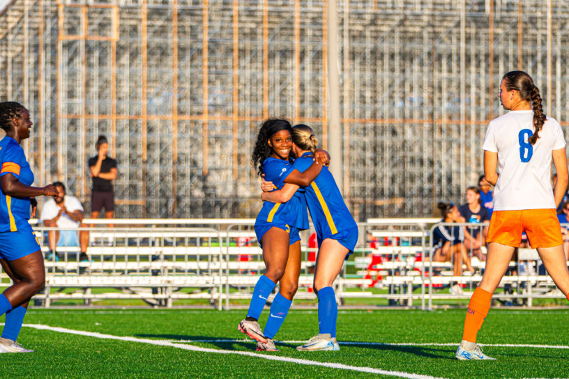 TMU celebrates a goal