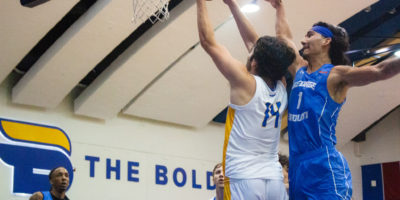 A TMU player attempts to shoot