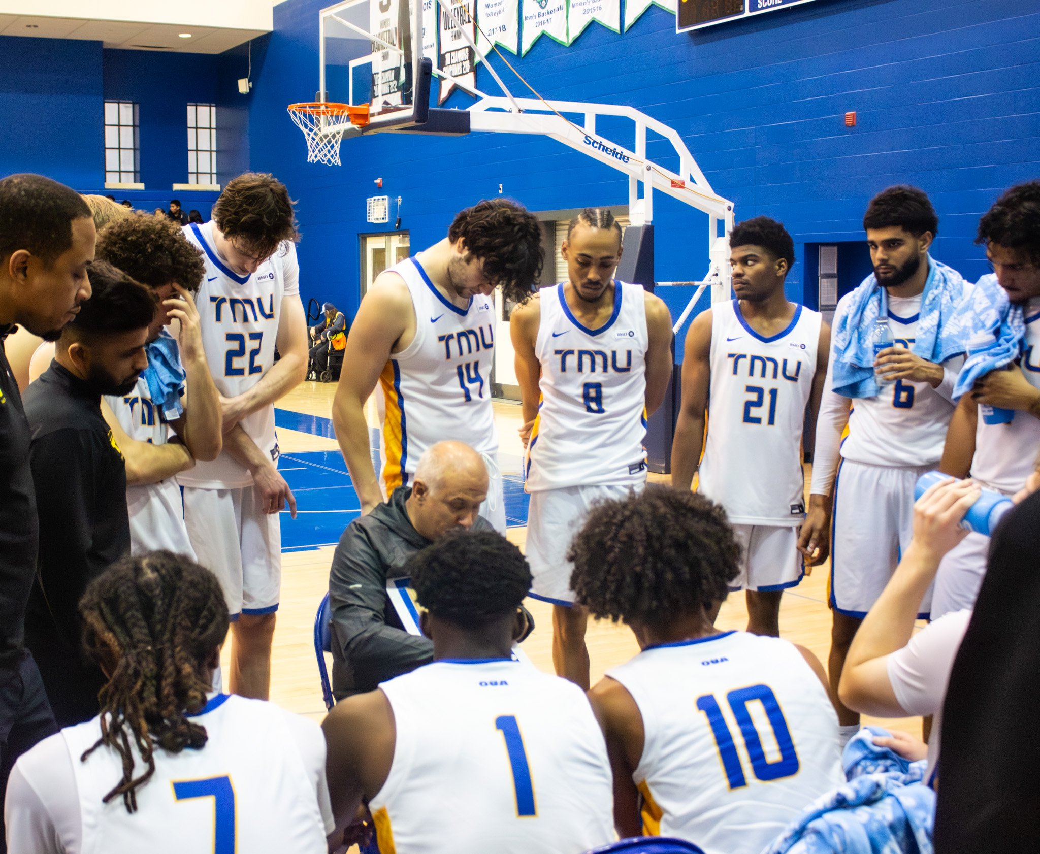 TMU huddles before the game