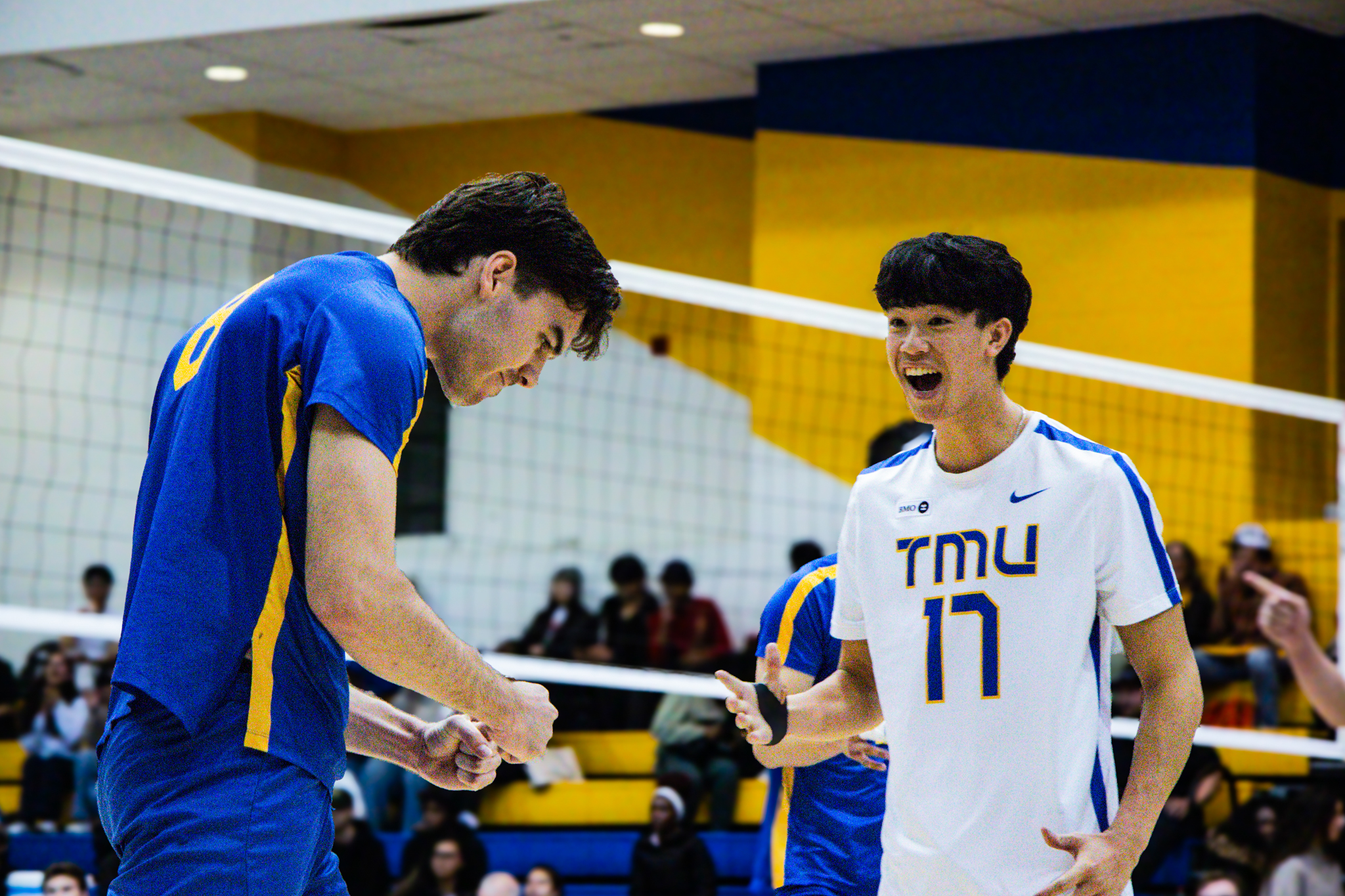 Ethan Lau and Riley Donovan celebrating a point