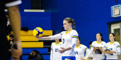 Kaiya Krahn sets up to serve to opponent