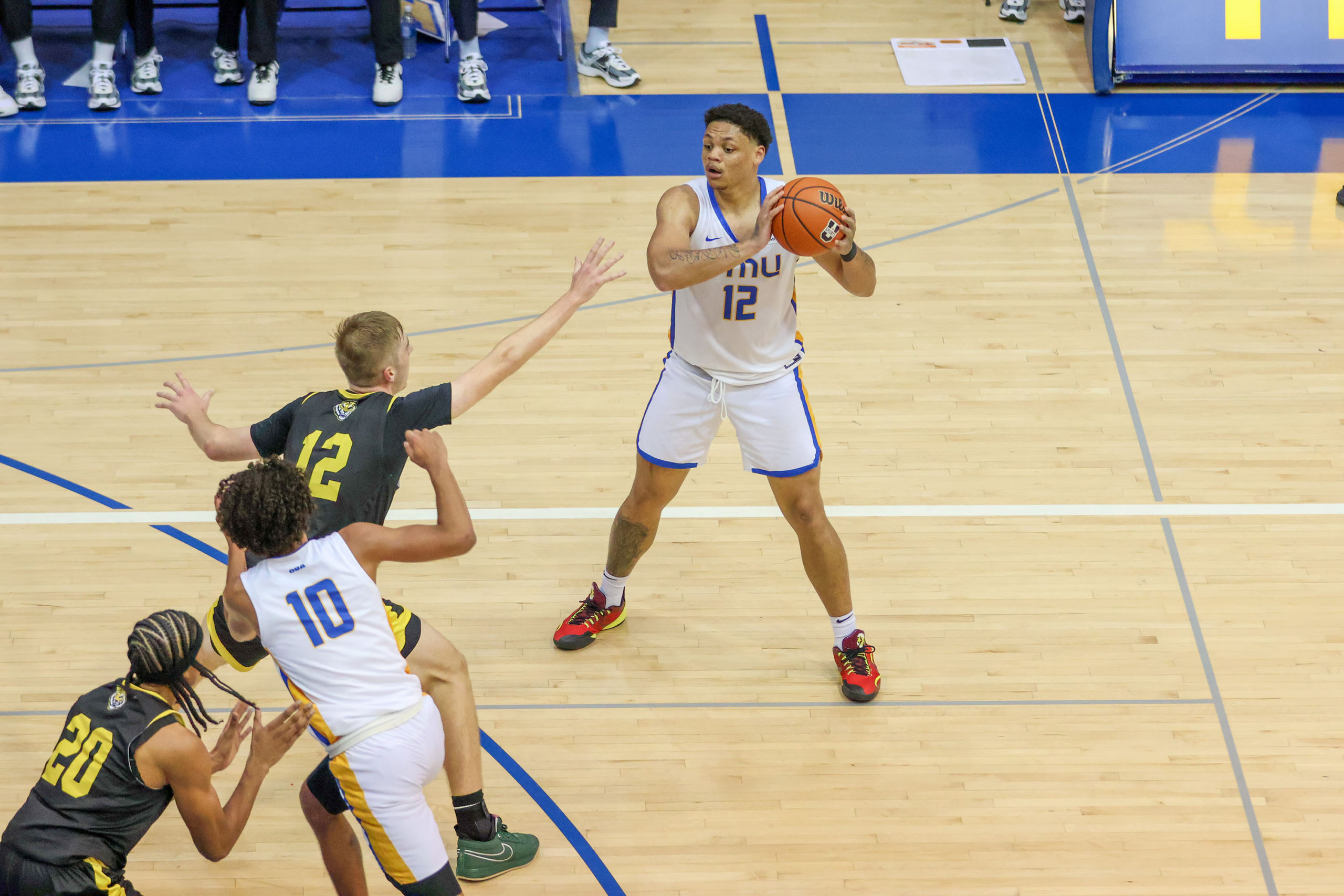 Aaron Rhooms attempts to pass