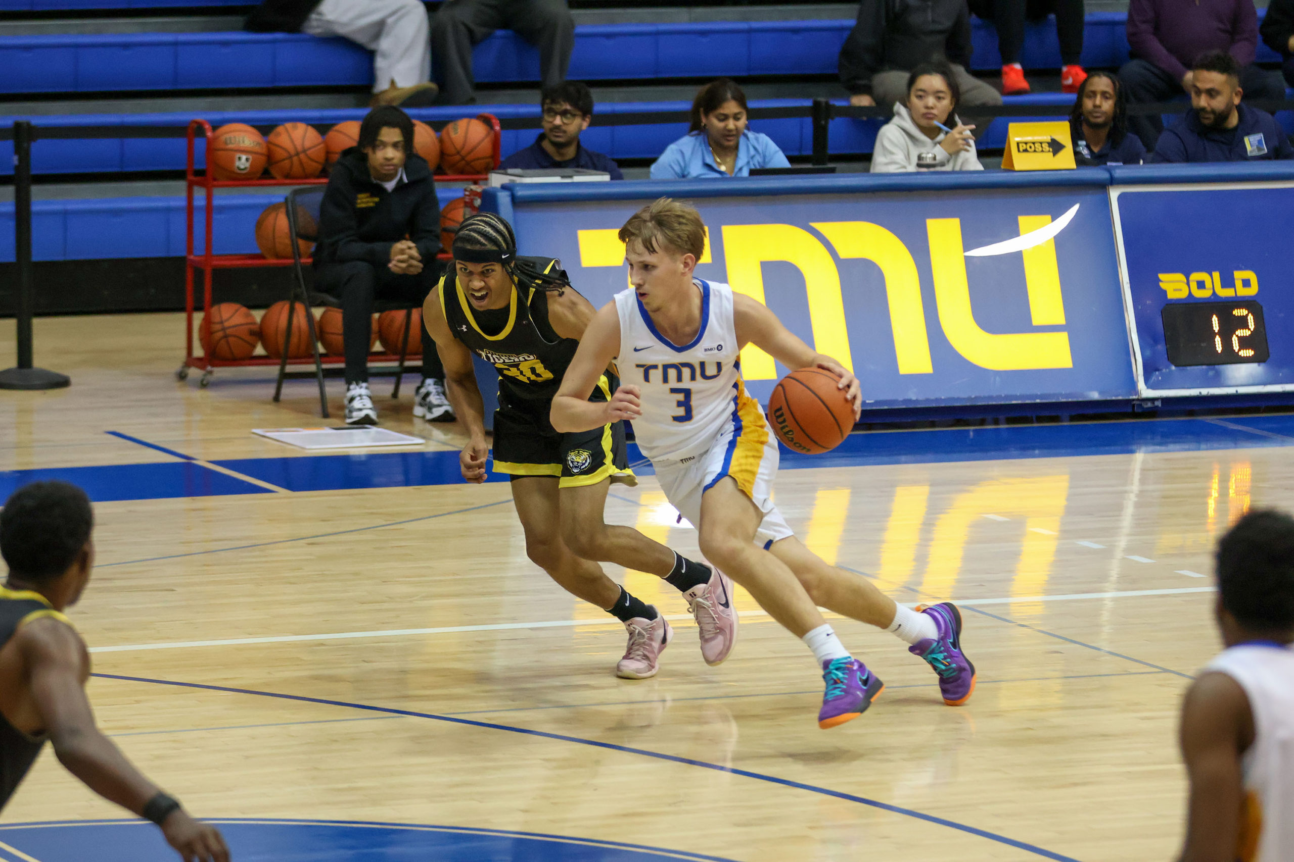 Kevin Toth gets around a Dalhousie player