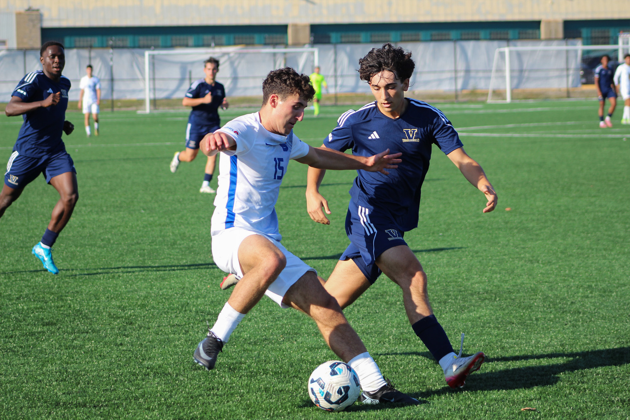 A TMU and Laurentian fight for possession