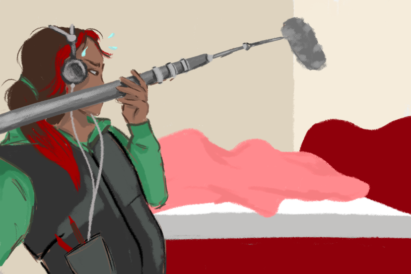 Illustration of a person with brown and red hair with headphones and holding a long boom mic that is pointed at a bed. The bed has a pink blanket on it that shapes under it.