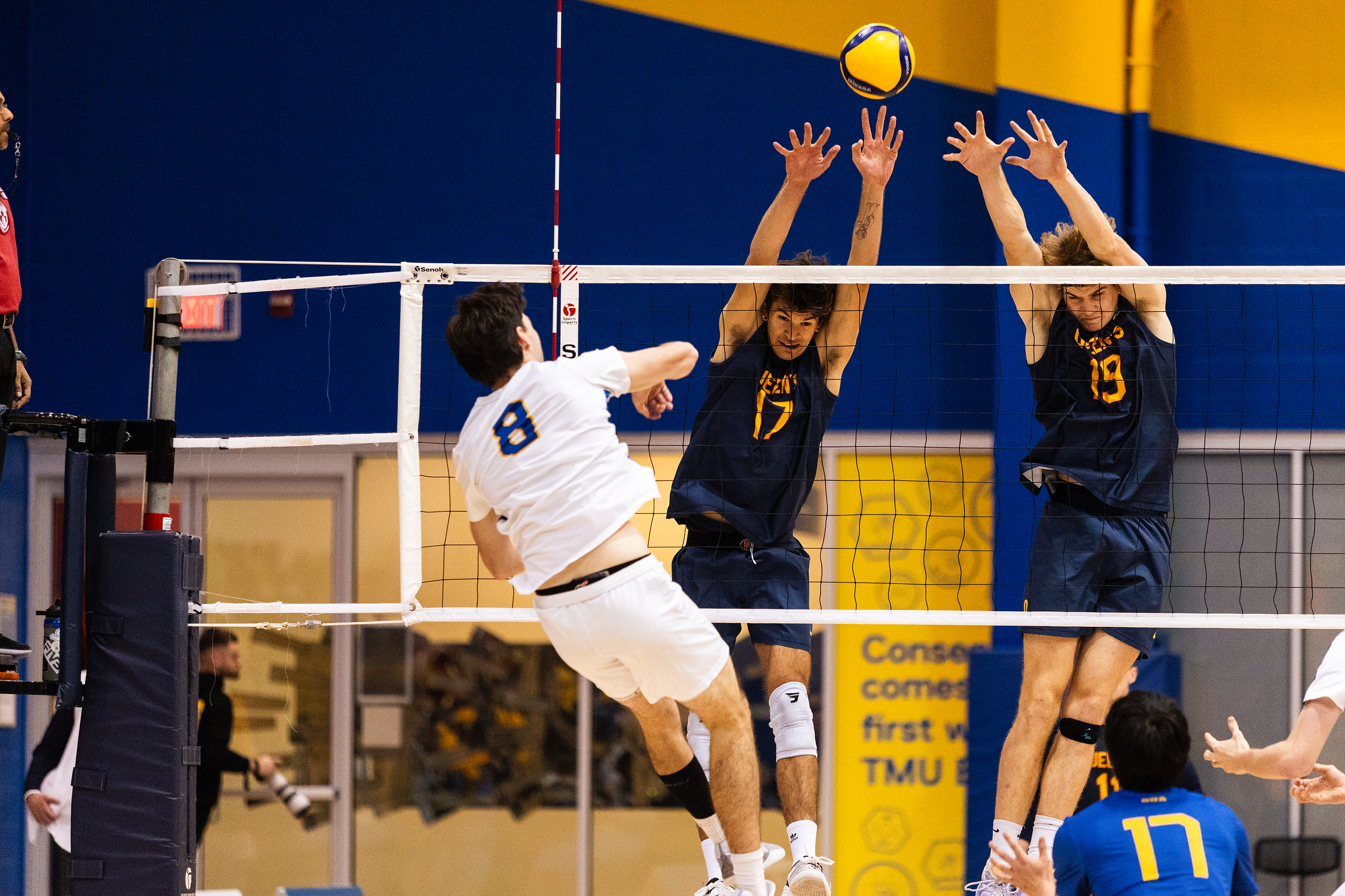 Queen's reach to block a kill from Riley Donovan