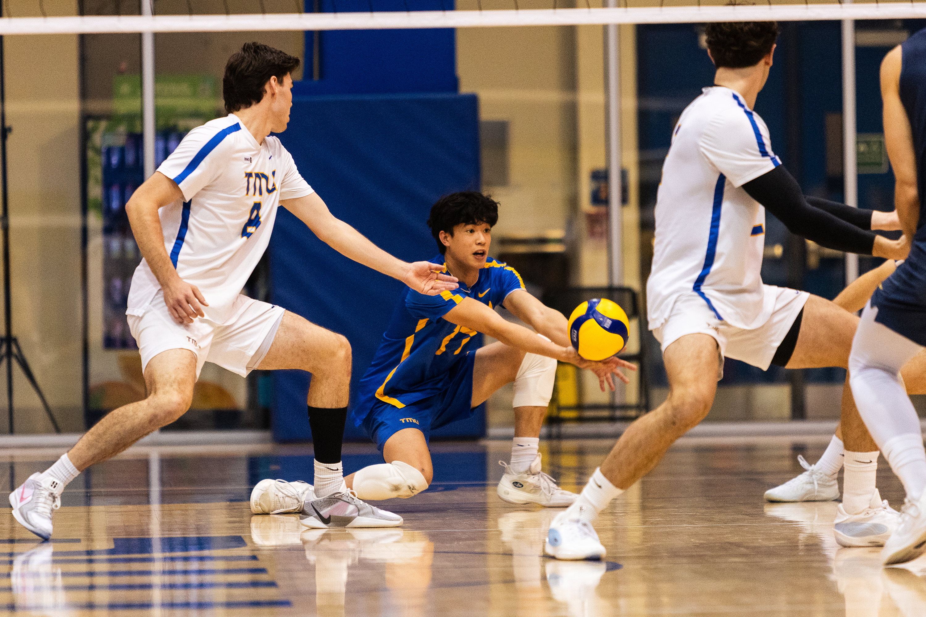 Ethan Tang attempts to receive the ball