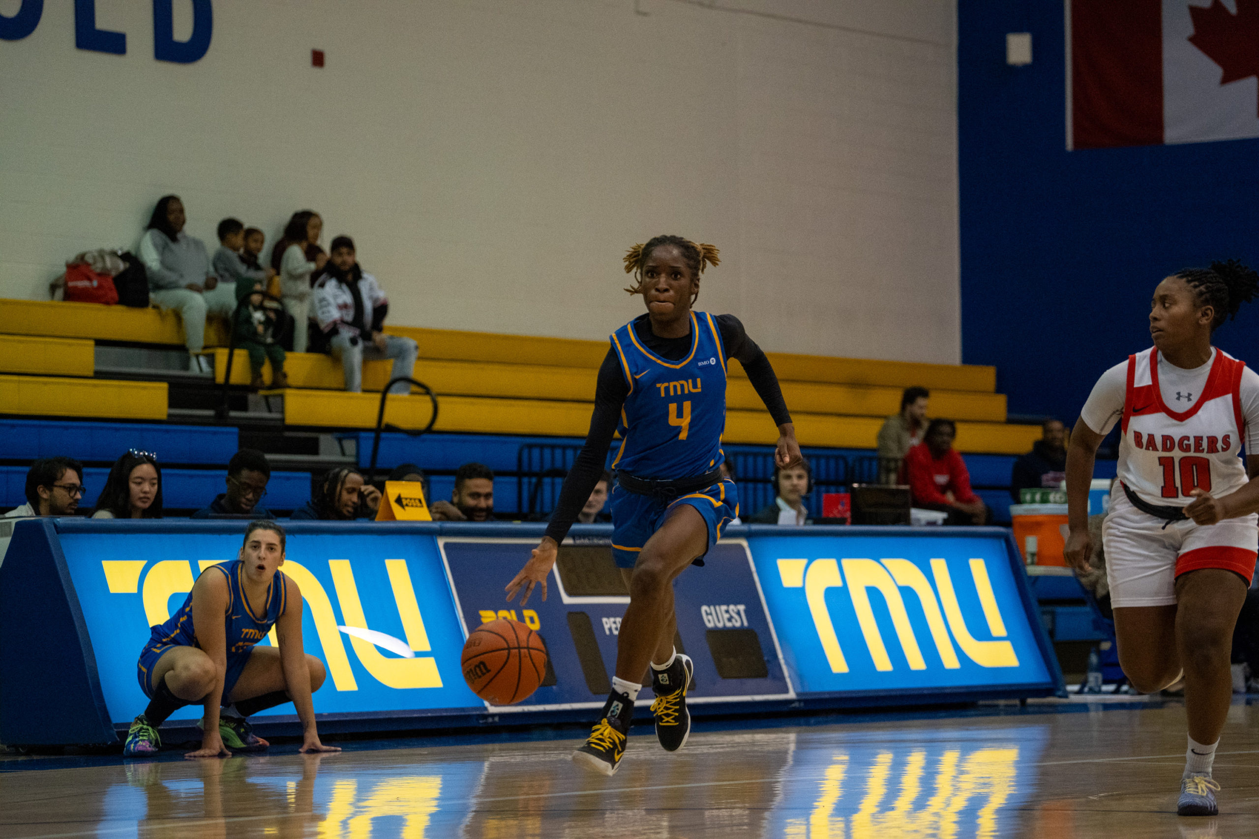 Myriam Kone dribbling the ball up the court at the Mattamy Athletics Centre