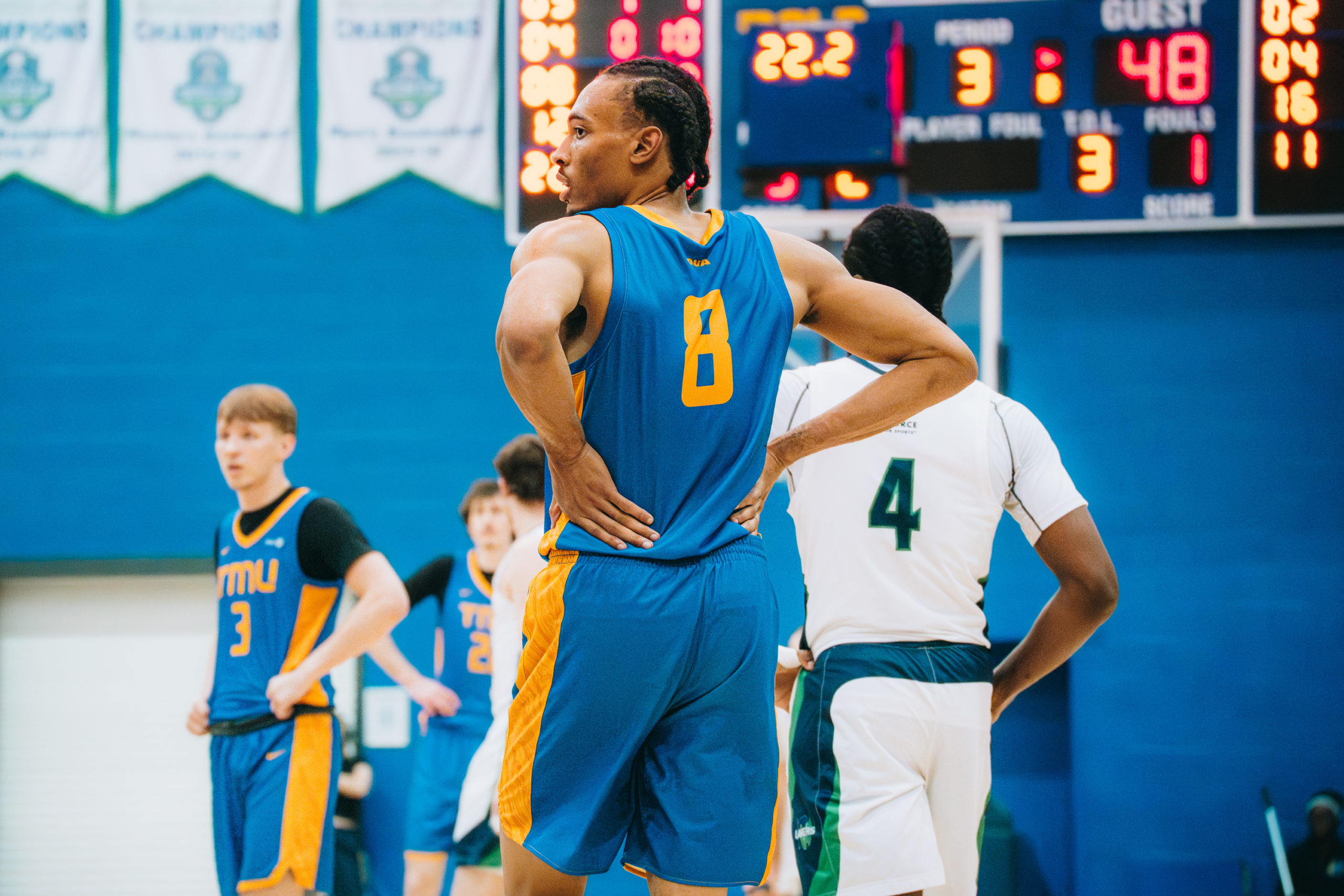 Deandre Goulbourne with his hands on his back at the Mattamy Athletics Centre