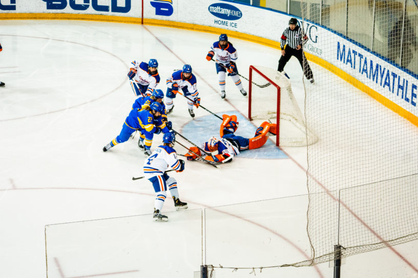 Ontario Tech's goaltender dives to make a save