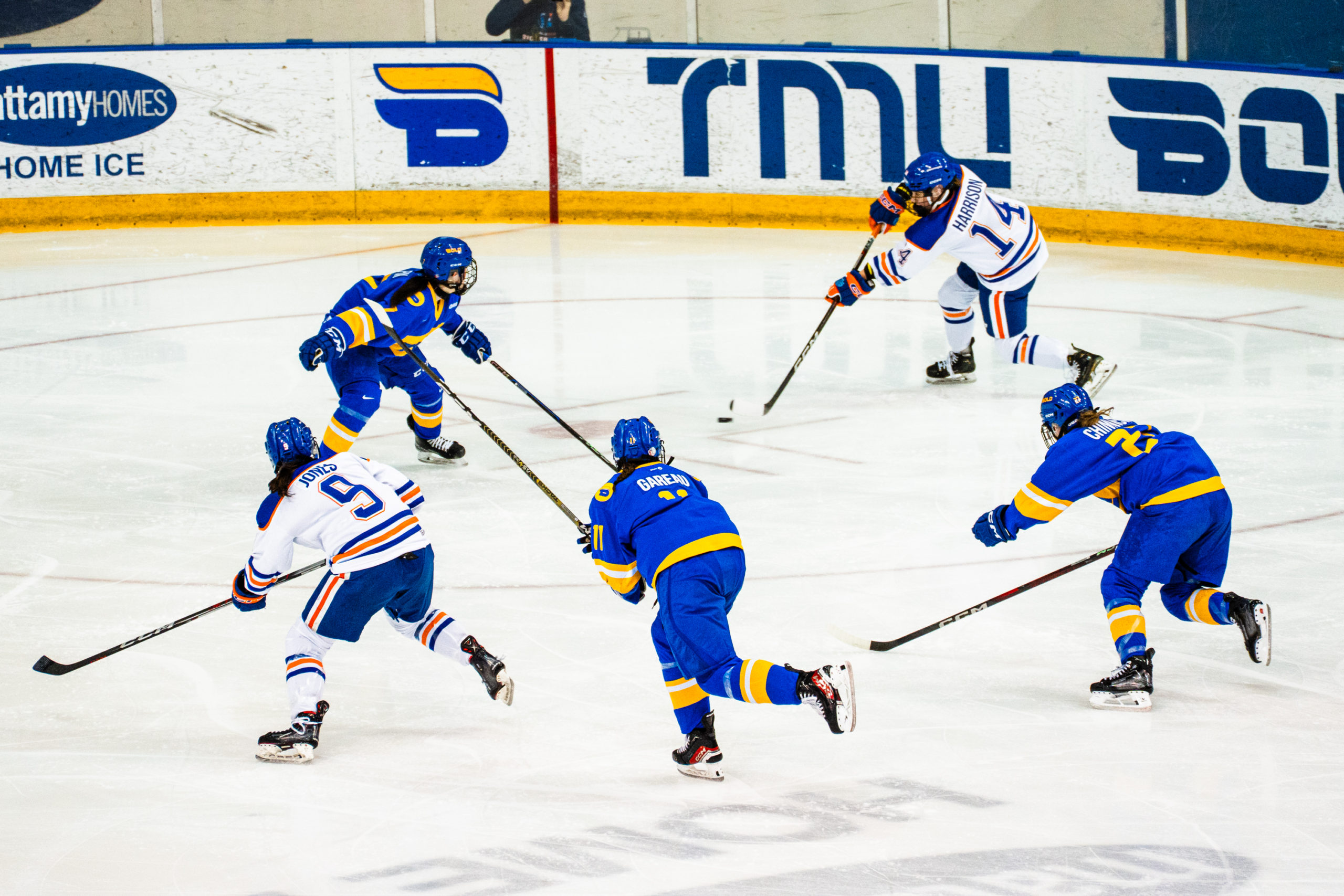 TMU tries to gain possession