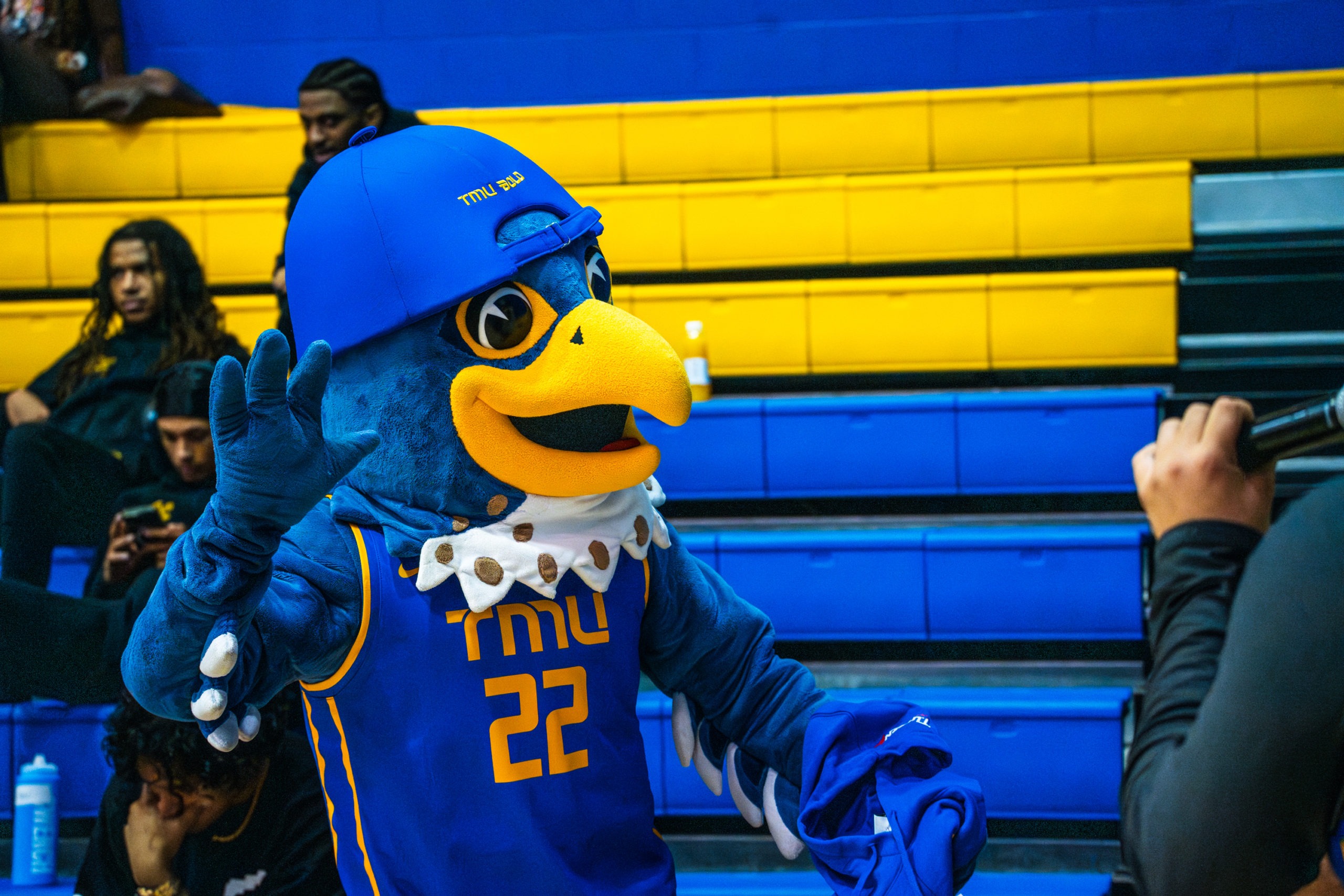 Frankie the Falcon attends the women's basketball Y2K night